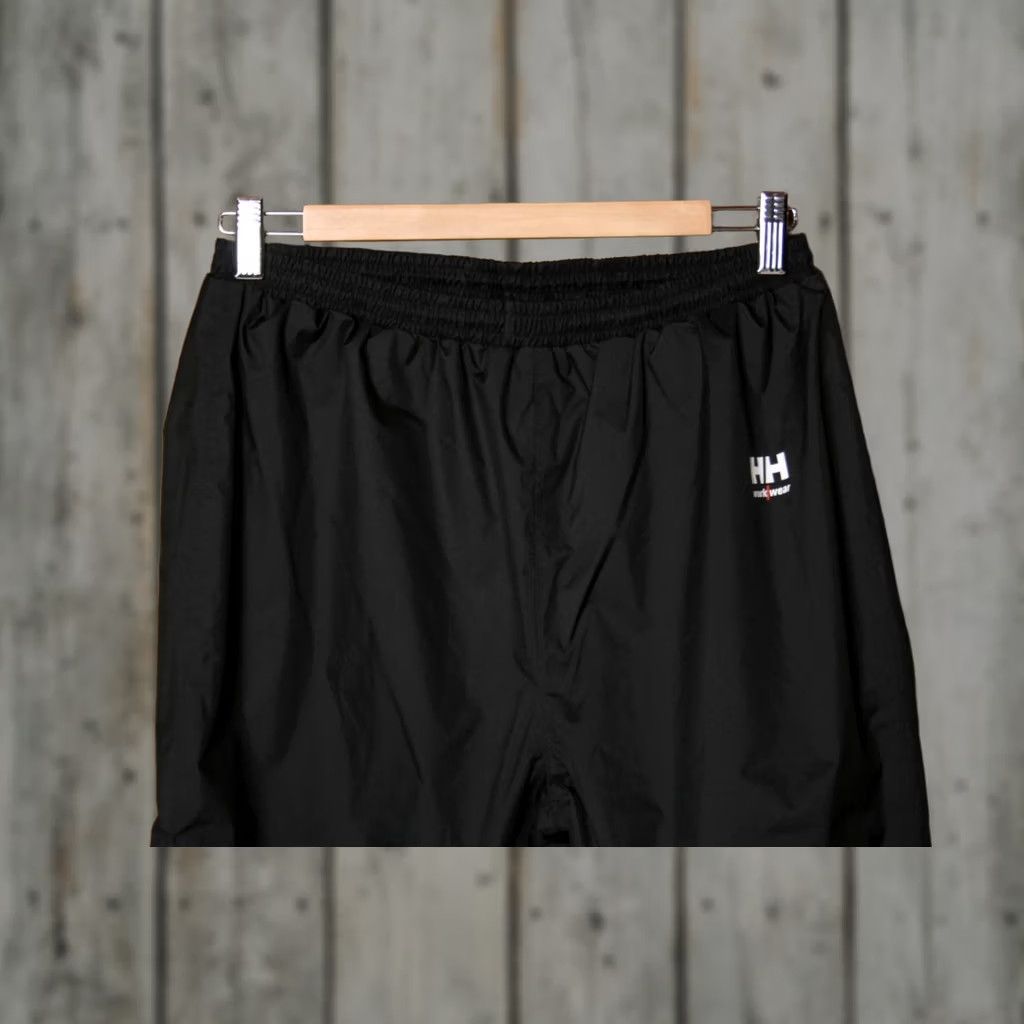Helly Hansen HELY HANSEN Workwear Manchester Waterproof Windproof Rain Pants Men's Sz. S, Black, Polyester, Inseam 29.5 in, Waterproof, Rain Pants, Men, Size S Size US 29 - 1 Thumbnail