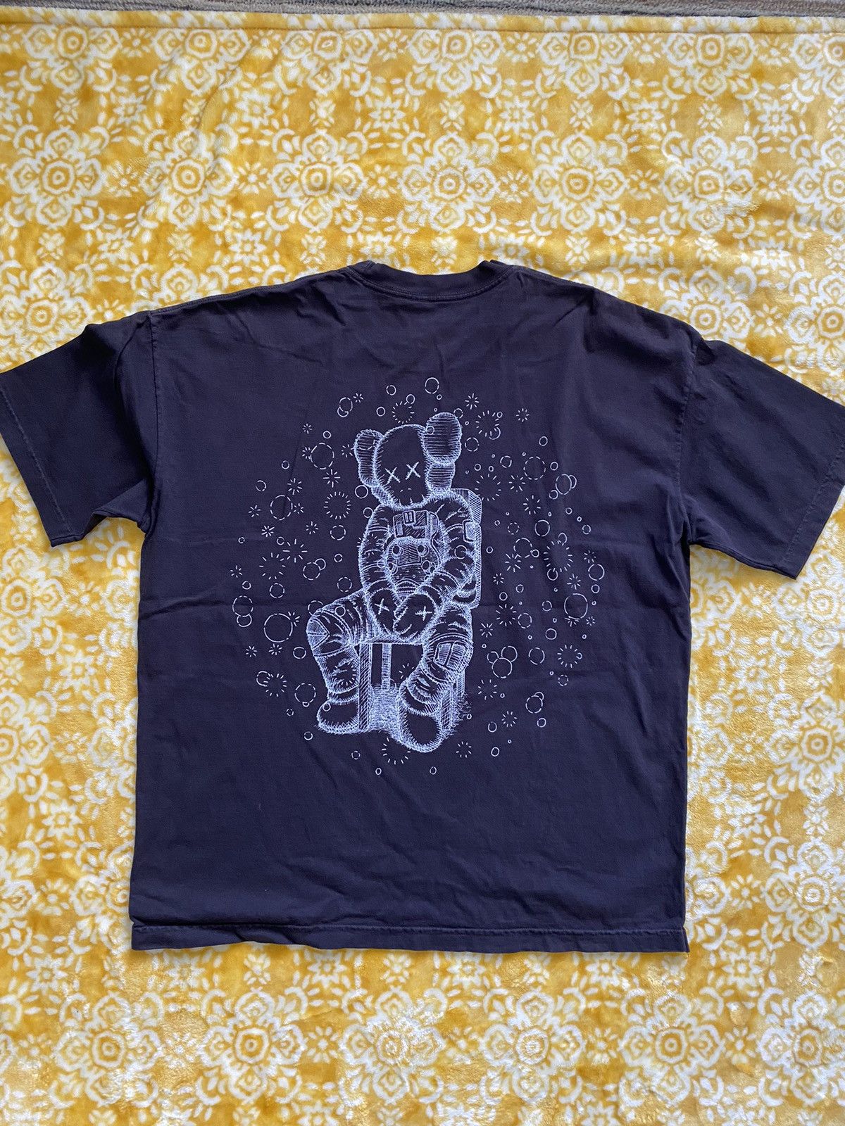 Kaws for authentic Kid Cudi tee