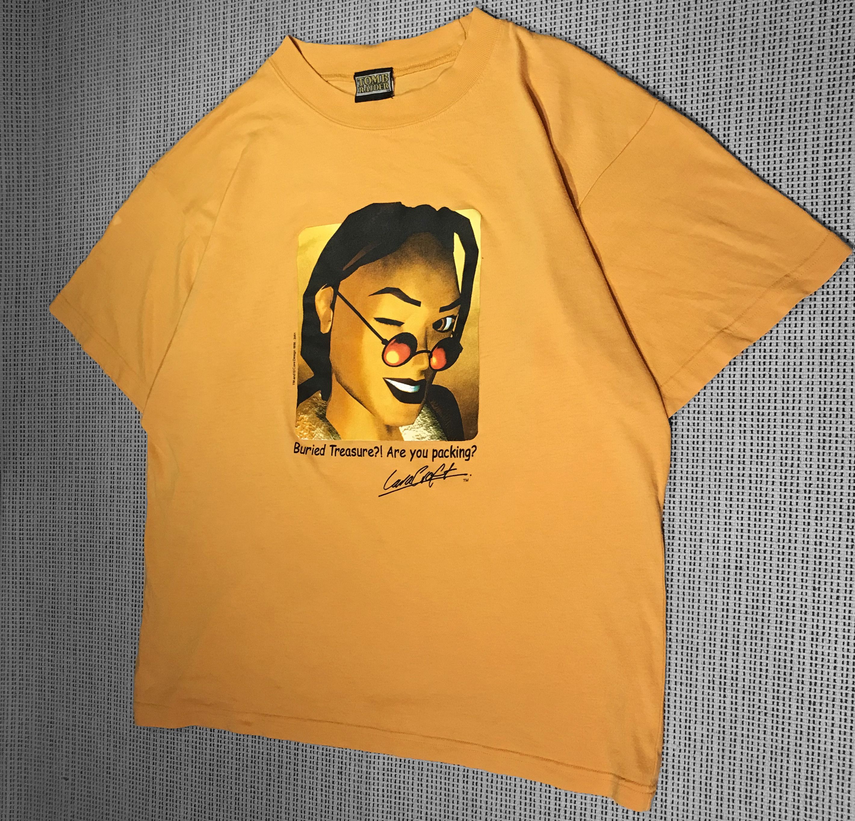 Vintage Vintage yellow T-shirt 1996/2001 Tomb Raider video game (XL) Size US XL / EU 56 / 4 - 1 Thumbnail