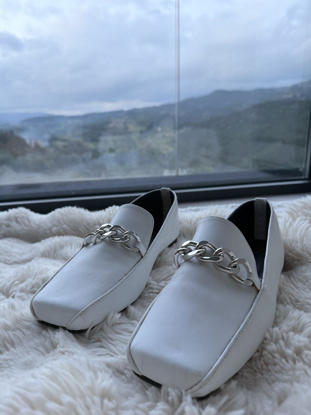 White squared tip leather