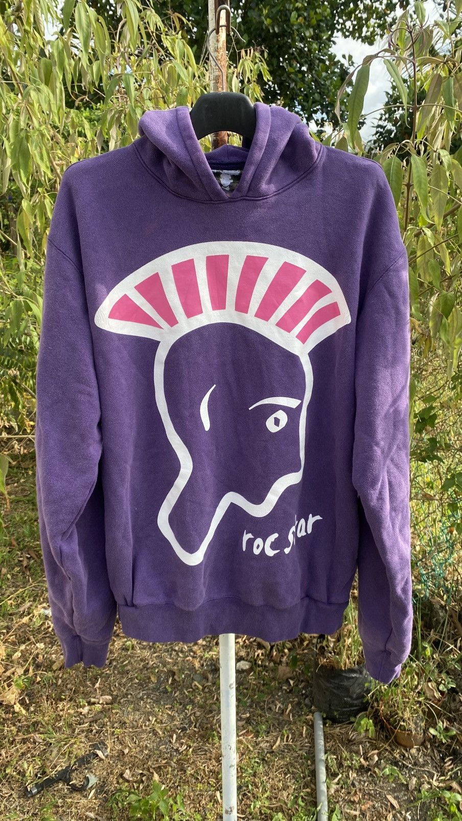 purple hoodie with a graphic print and 