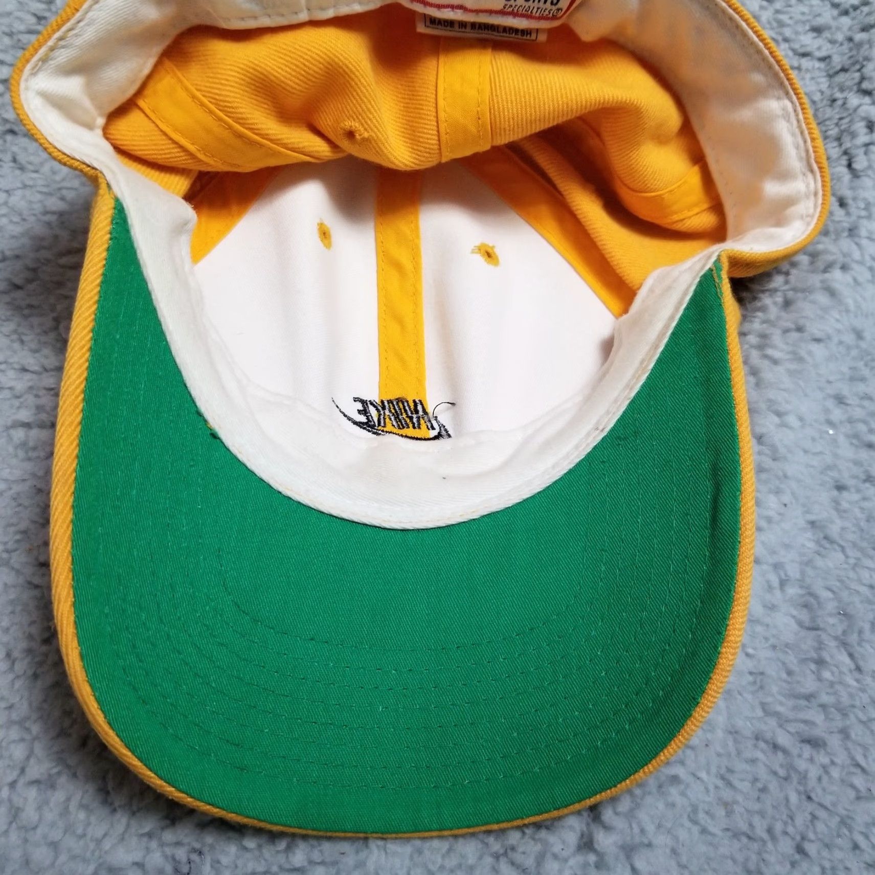 Nike VINTAGE Nike Hat Cap Fitted Mens 7 1/8 Yellow Sports Specialties Wool 90s Baseball Cap Mens Fitted 7 1/8 Yellow Green Under Brim Retro 90s Size ONE SIZE - 3 Thumbnail