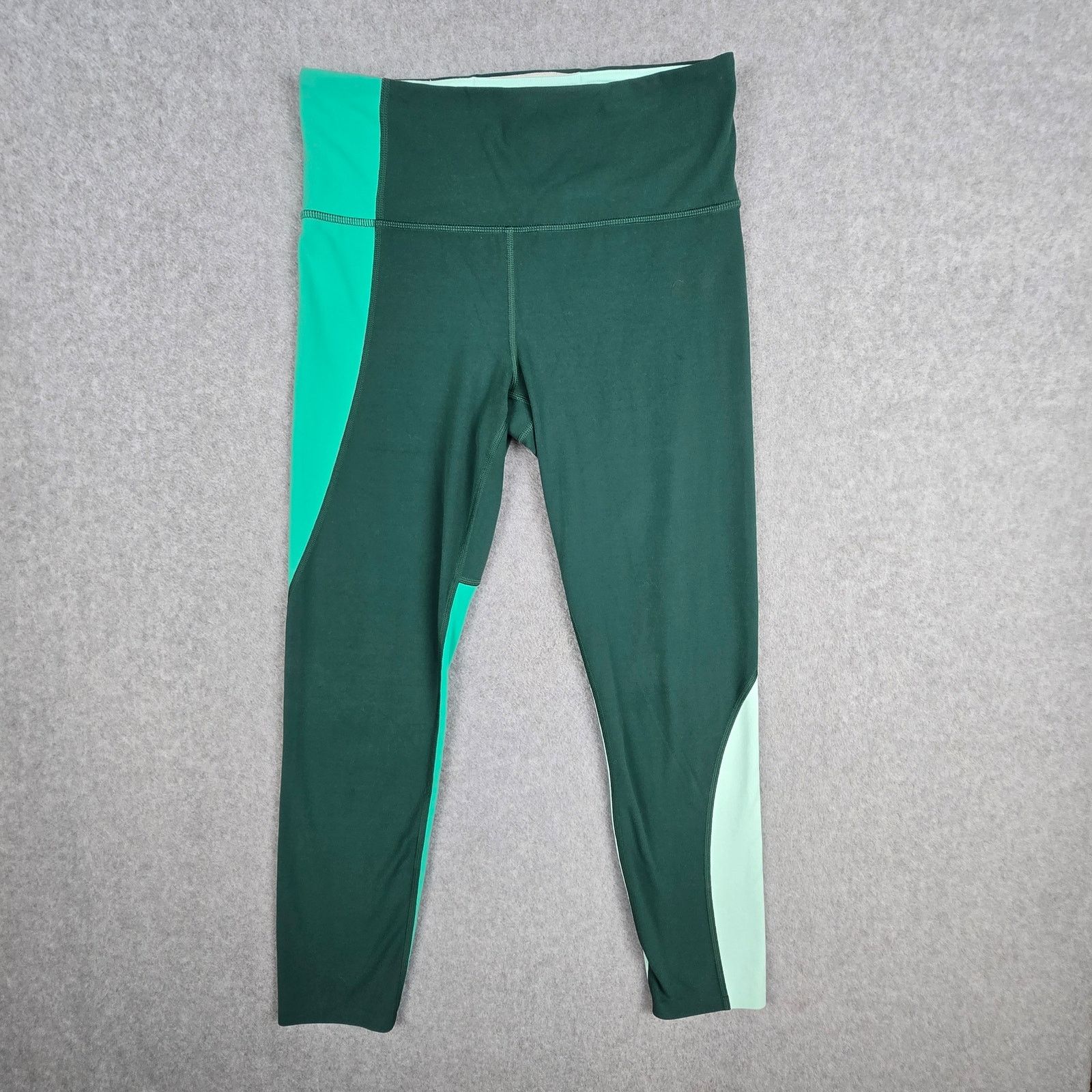 Athleta Athleta Medium Green Colorblock Elation Asym 7/8 Leggings Size 28" / US 6 / IT 42 - 1 Thumbnail