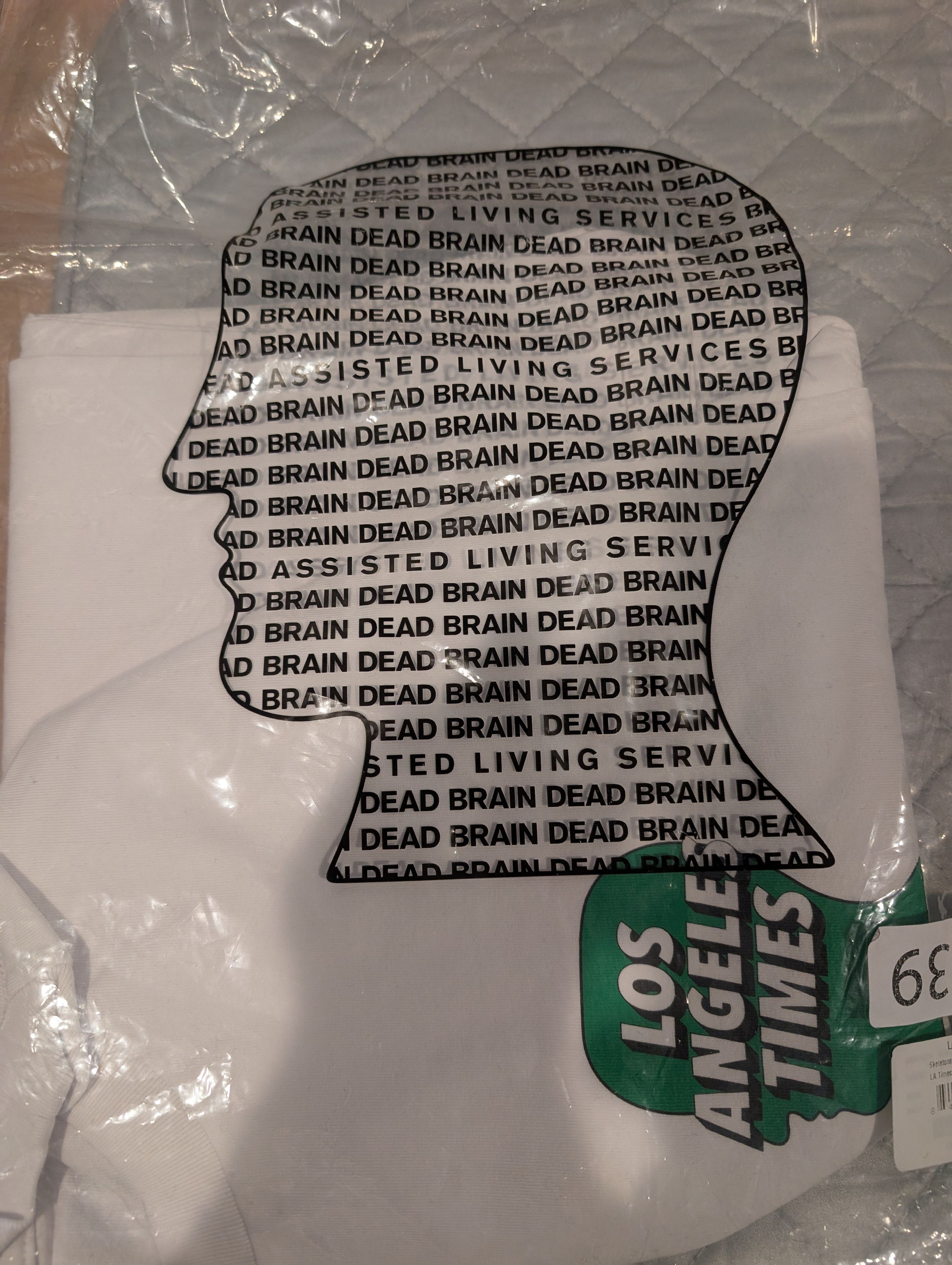 Brain Dead Brain Dead x Los Angeles Times Colab size L Size US L / EU 52-54 / 3 - 11 Thumbnail