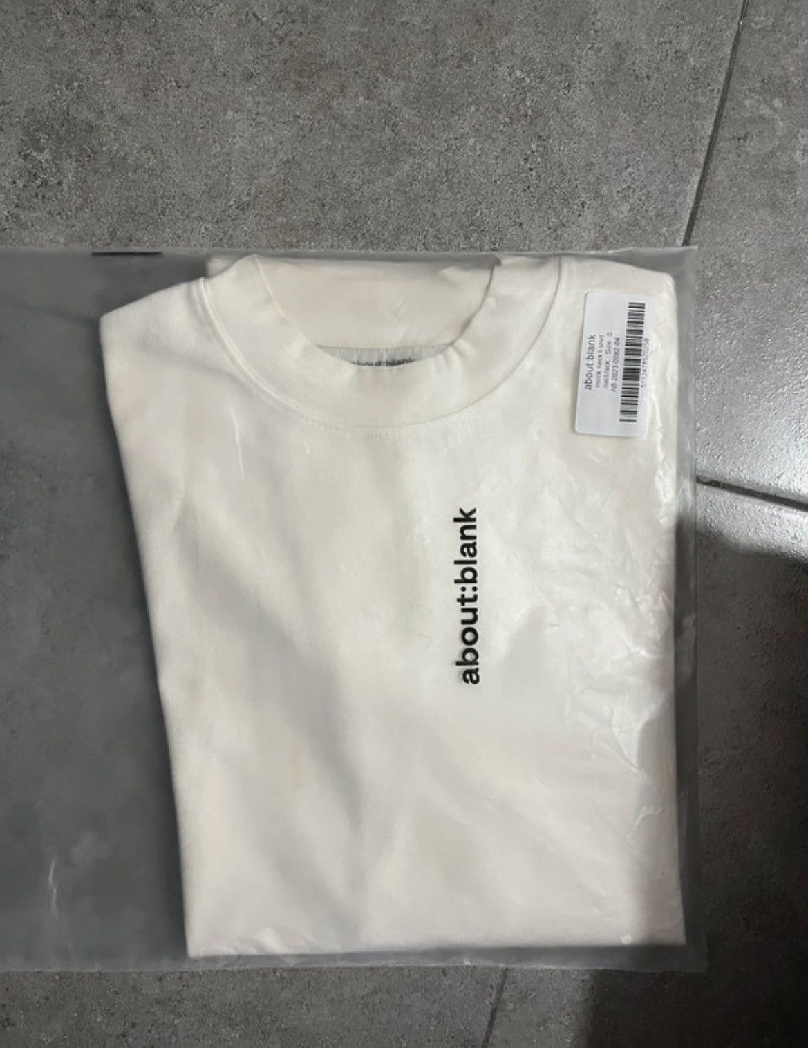 About:Blank about:blank mock neck box t-shirt - ecru (S) Size US S / EU 44-46 / 1 - 5 Thumbnail