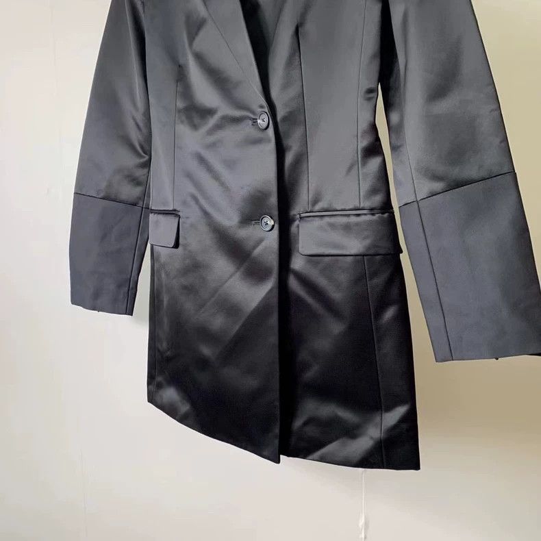 HELMUT LANG A satin waistcoat is an expensive long suit