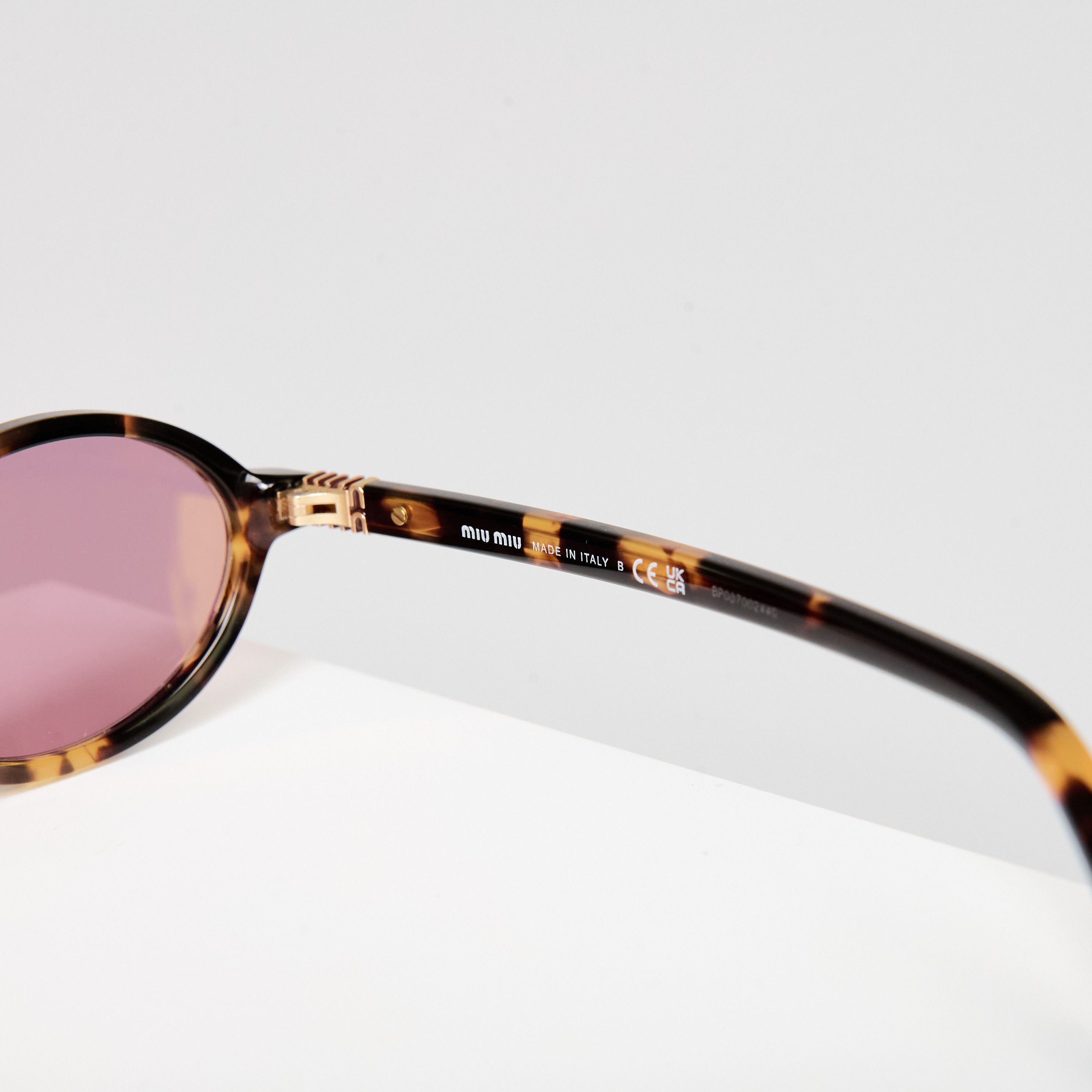 Miu Miu MIU MIU MU 04ZS VAU50D Eyewear HONEY Size ONE SIZE - 4 Thumbnail