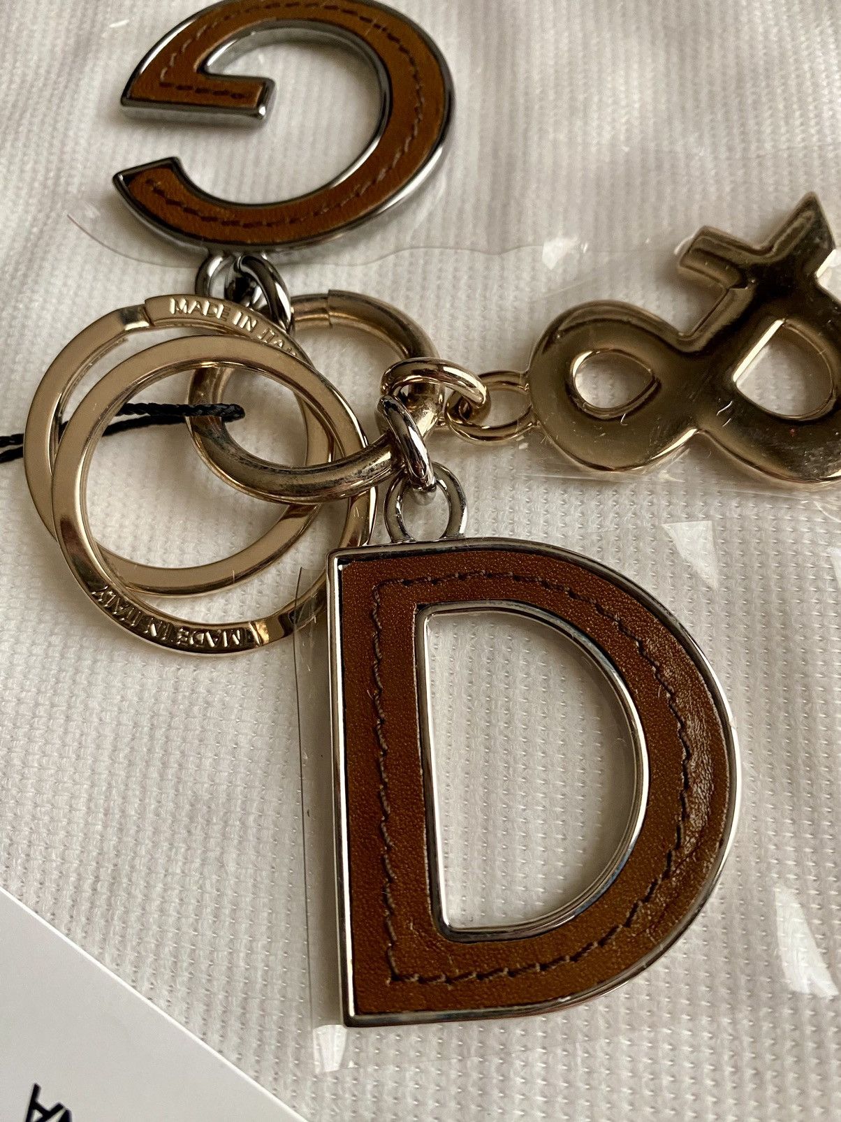 Dolce & Gabbana Dolce & Gabbana 🇮🇹 Metal/Brown Calf Palladium Charm Key Chain Size ONE SIZE - 1 Thumbnail