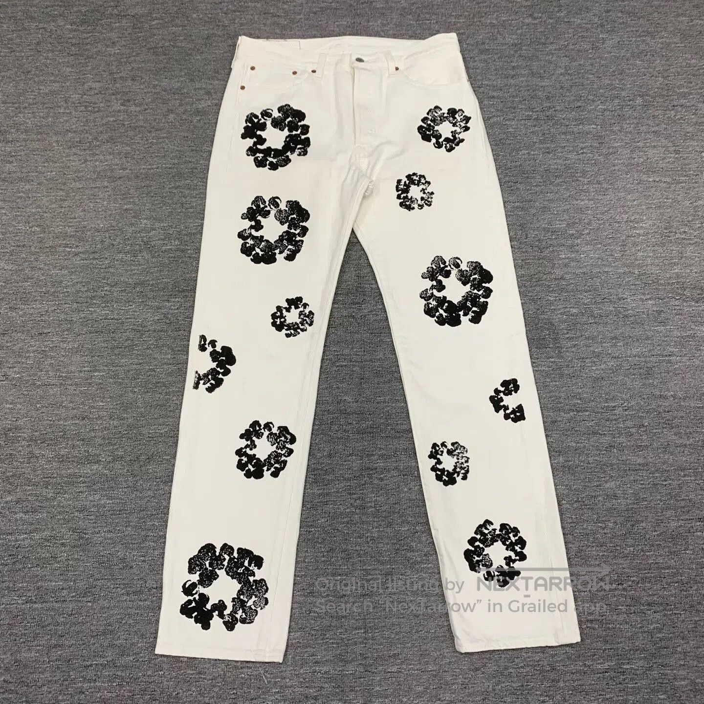 Levi's denim tears x levi's white flower jeans. Size 33" - 1 Thumbnail