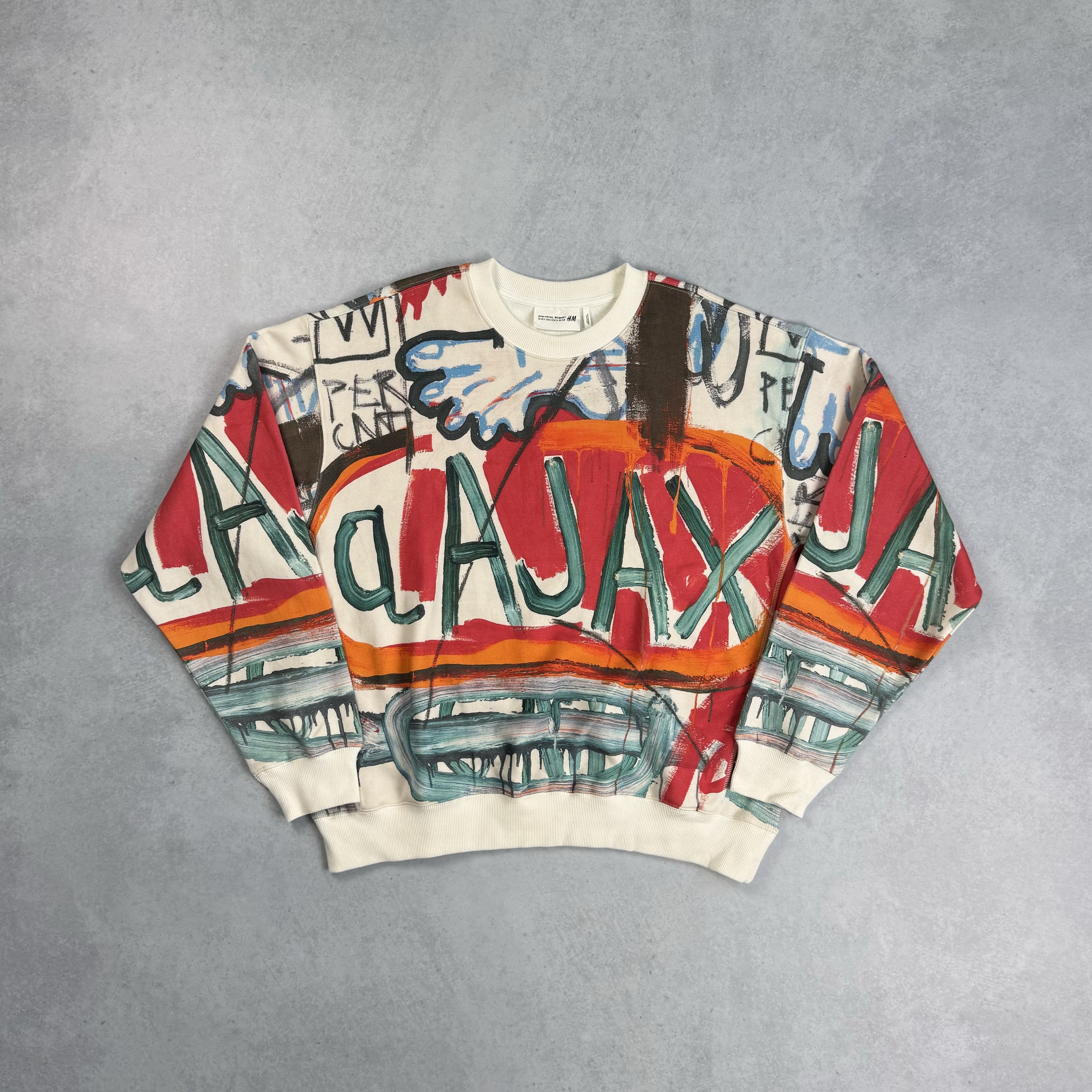 H&M × Jean-Michel Basquiat × Who Decides War WHO DECIDES WAR x EV BRAVADO TELA D'AMORE X BASQUIAT x H&M Size US M / EU 48-50 / 2 - 4 Thumbnail