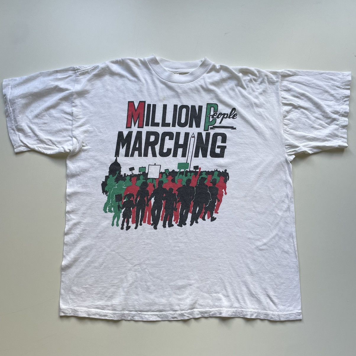 image of Art x Made In USA Vintage 90's Million People Marching Usa Graphic T Shirt in White (Size Large)