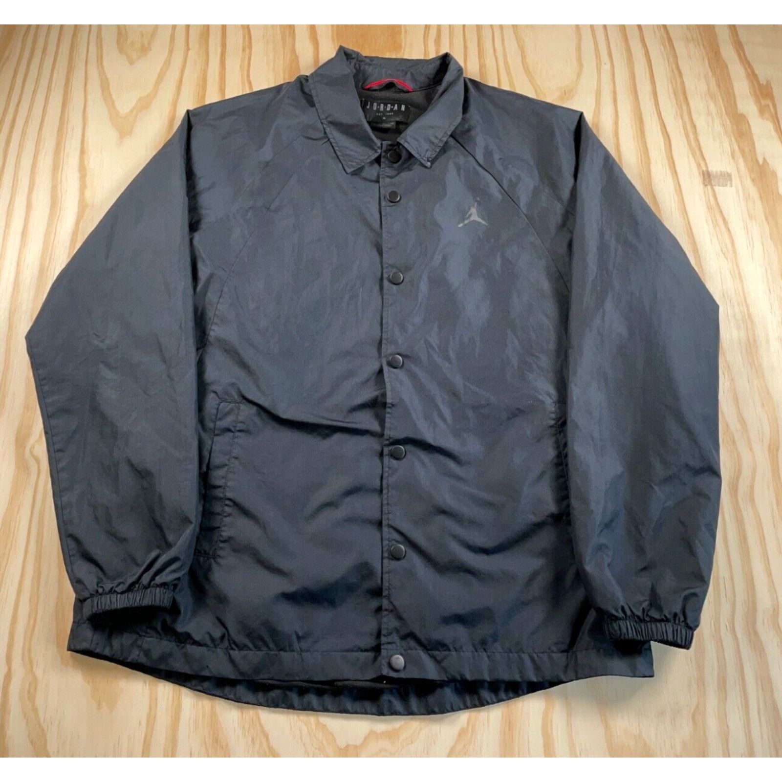 image of Jordan Brand Snap Button Windbreaker Coach's Jacket Adult XL Black Lined Jumpman Logo in White