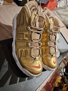 Nike uptempo supreme on sale gold