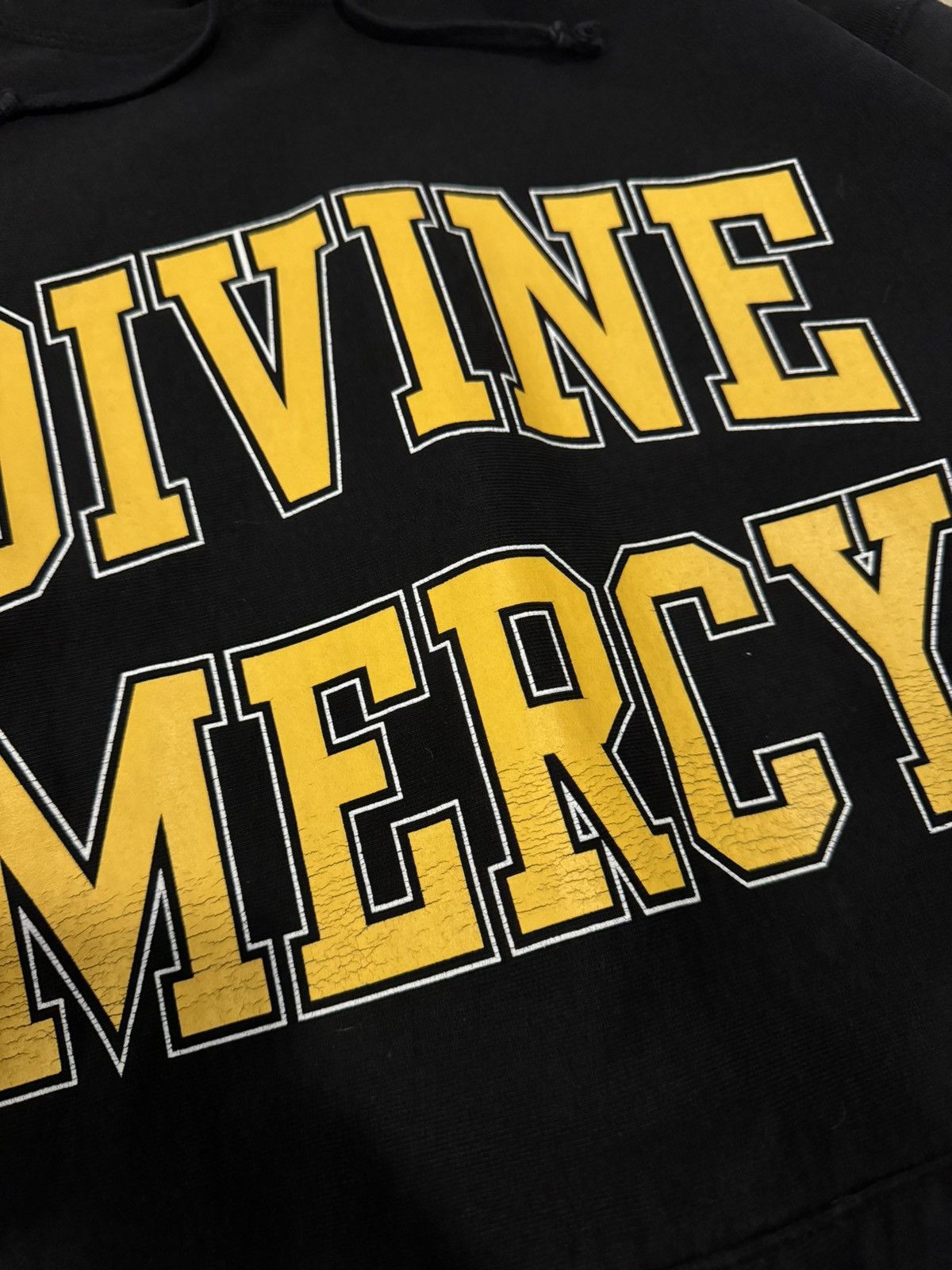 Supreme Supreme Divine Mercy Hoodie Black Yellow | Grailed