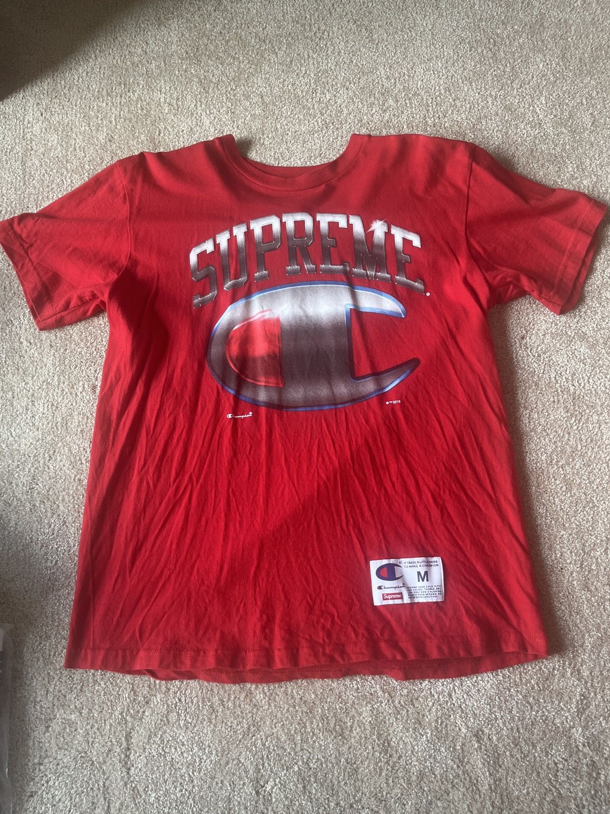Supreme champion shirt
