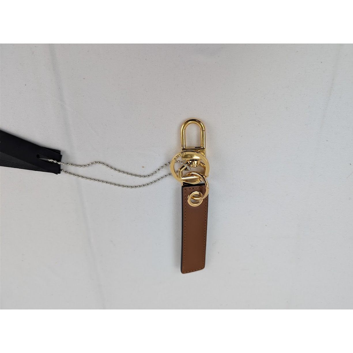 Amiri o1rshd1 Q:3 / Size: OS / Nappa Tao Keychain in Brown Size ONE SIZE - 1 Thumbnail