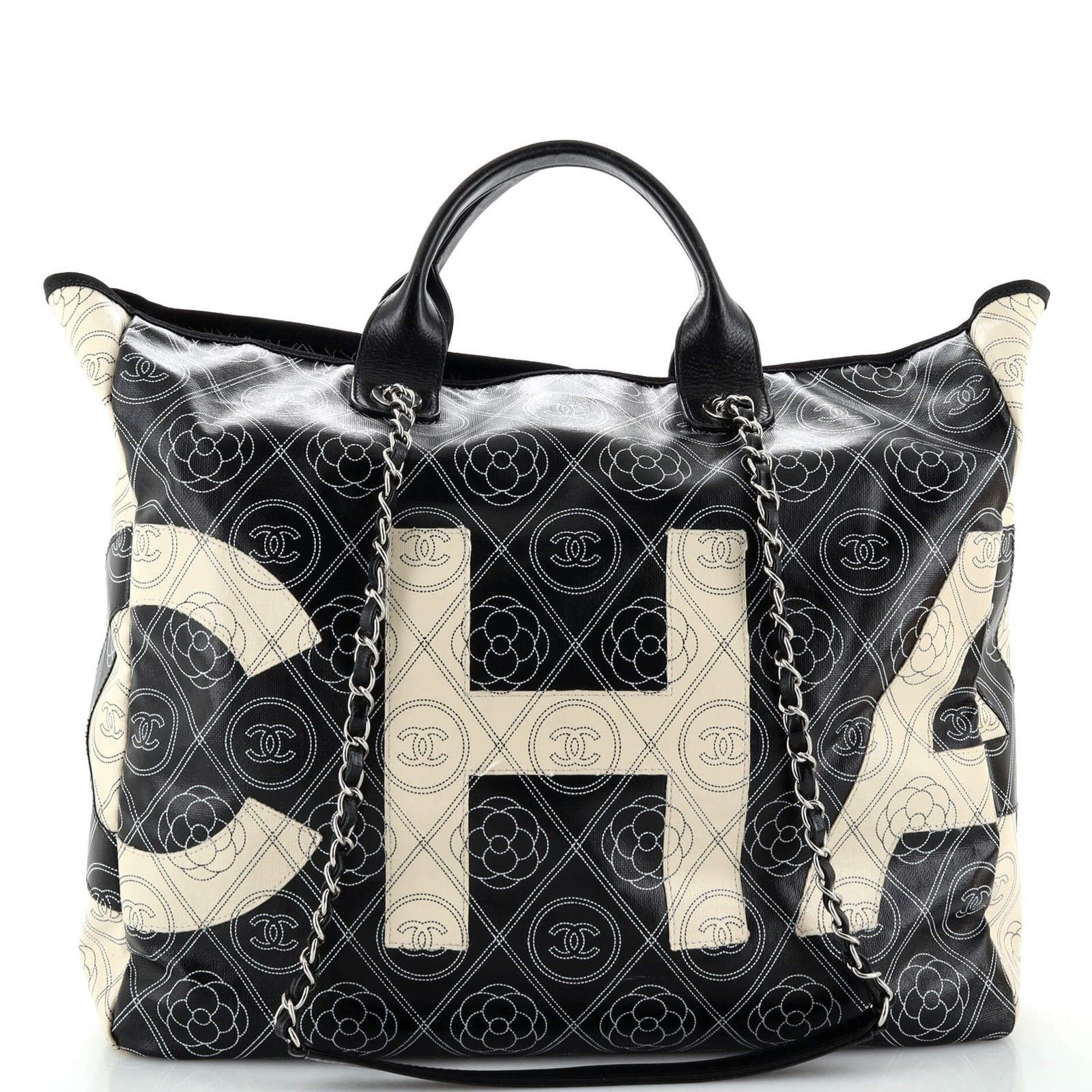 image of Chanel Logo Camellia Shopping Tote Printed Coated Canvas Medium in Black, Women's