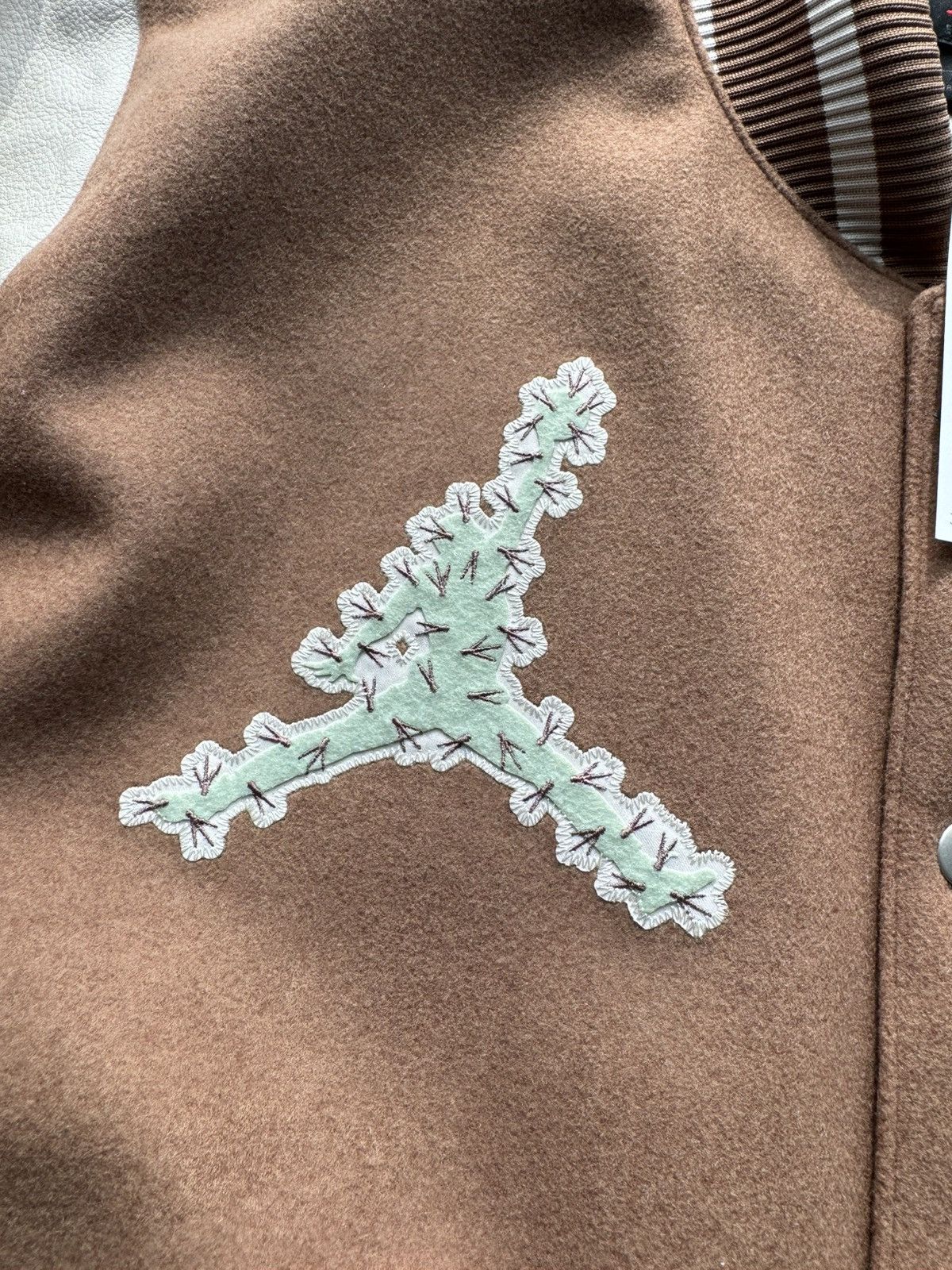 Cactus Jack x Jordan Varsity Jacket - threedaughtersproperties.com