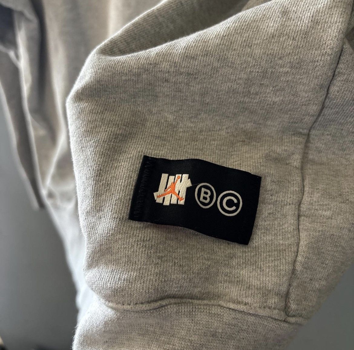 Jordan Brand × Undefeated Jordan x UNDEFEATED Hoodie Heather Gray Size US XL / EU 56 / 4 - 5 Thumbnail