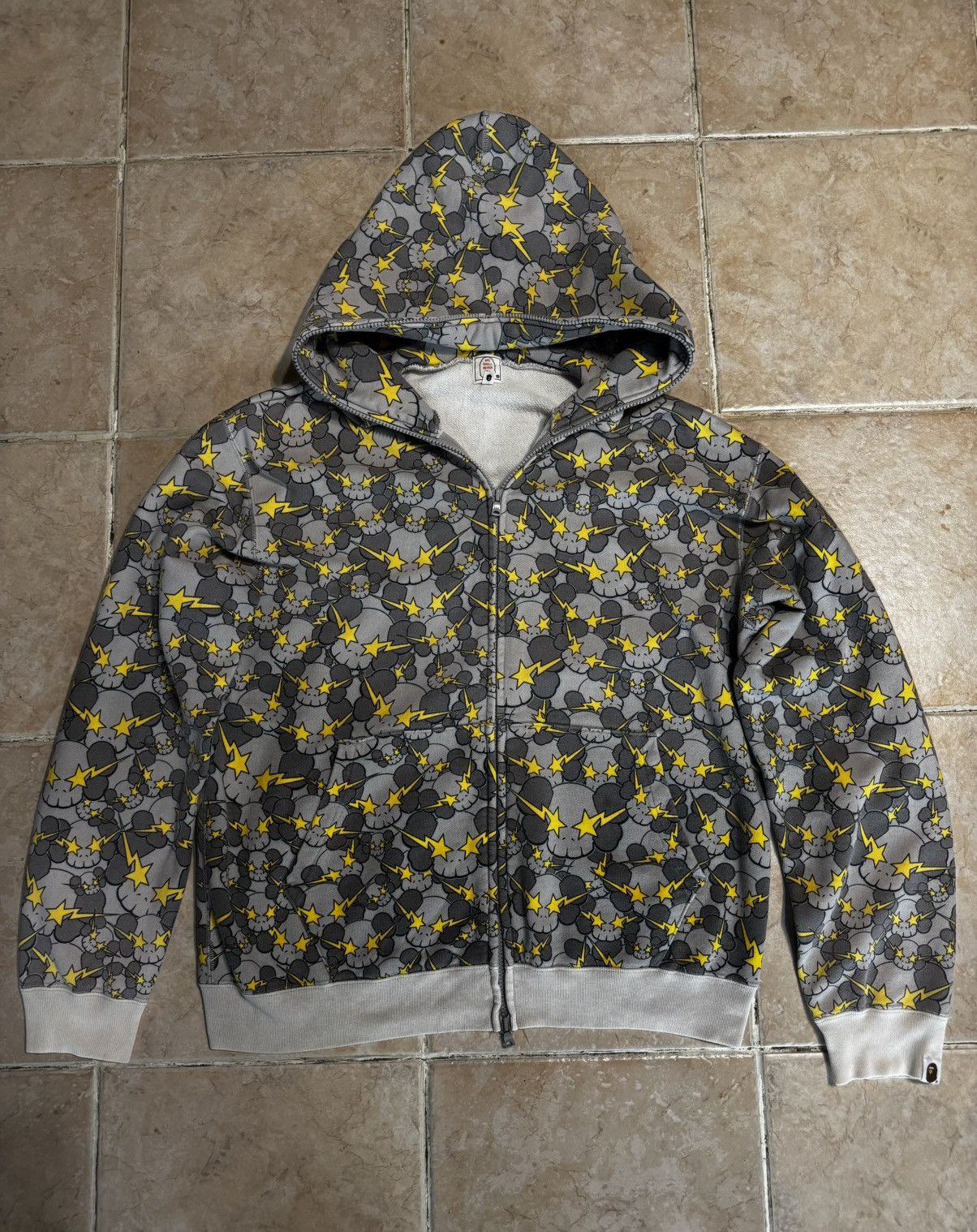 Bape × Kaws A Bathing Ape BAPE x Kaws Yellow Skullsta Full Zip
