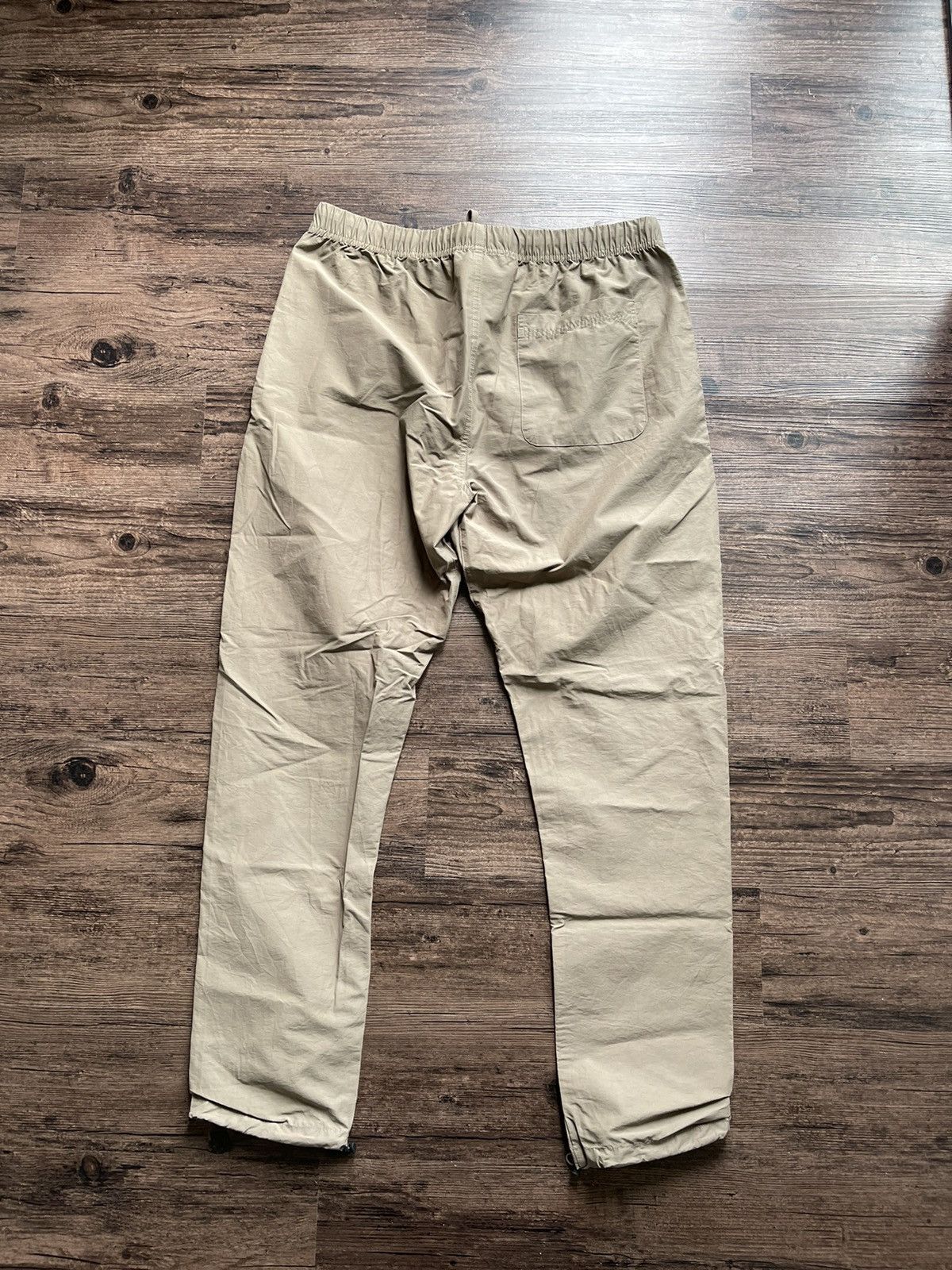 Essentials × Fear of God Fear of god essentials nylon track pant harvest size large. Size US 34 / EU 50 - 2 Thumbnail