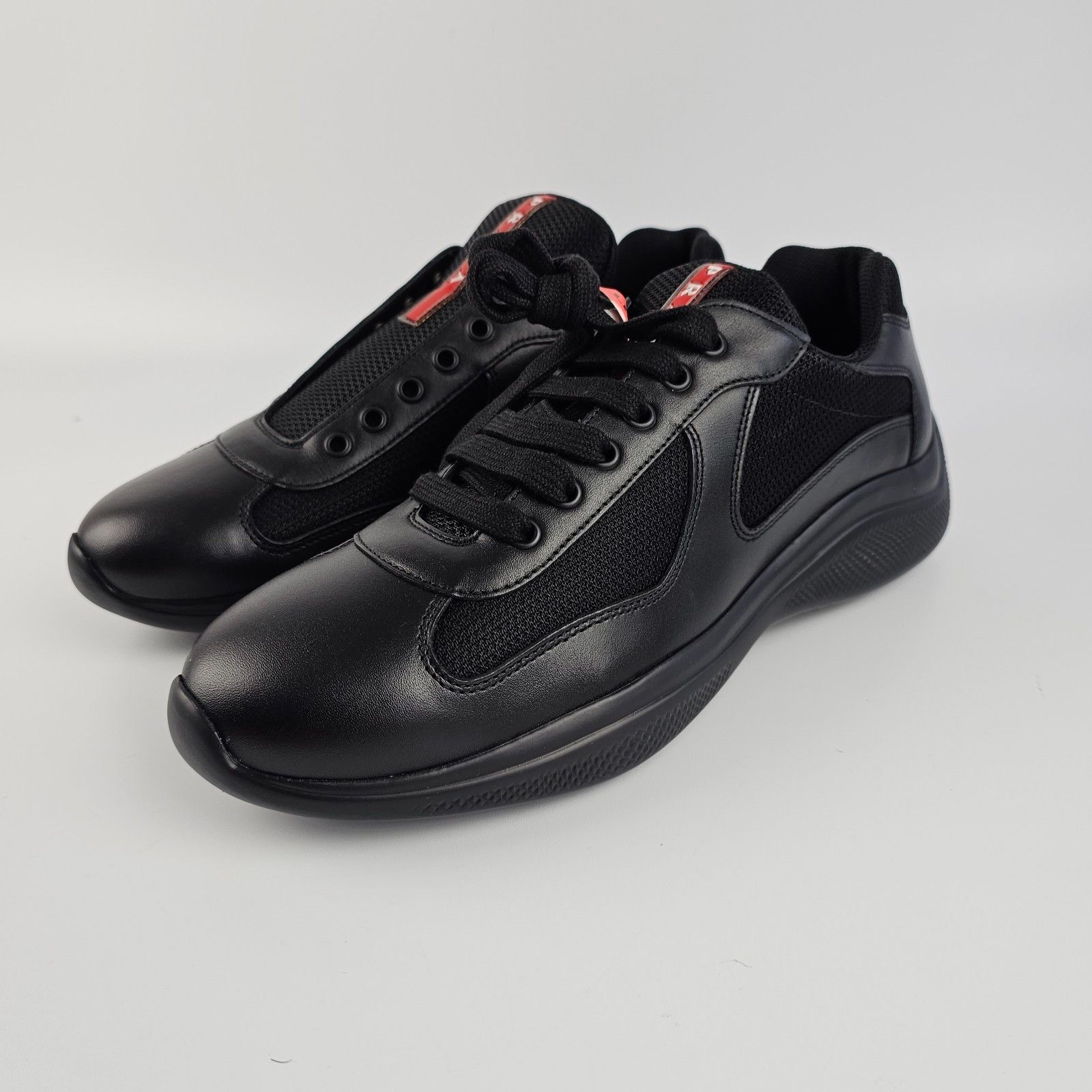 Prada Prada 4E 2057 leather sneakers | Grailed