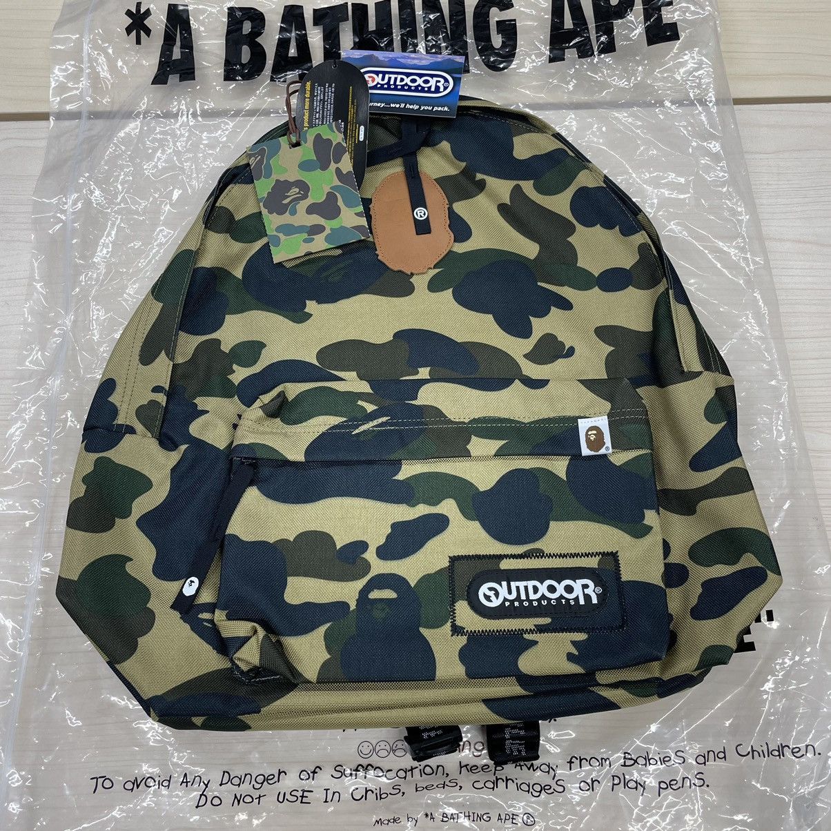 image of Bape X Outdoor Product 1St Camo Day Pack in Yellow, Men's