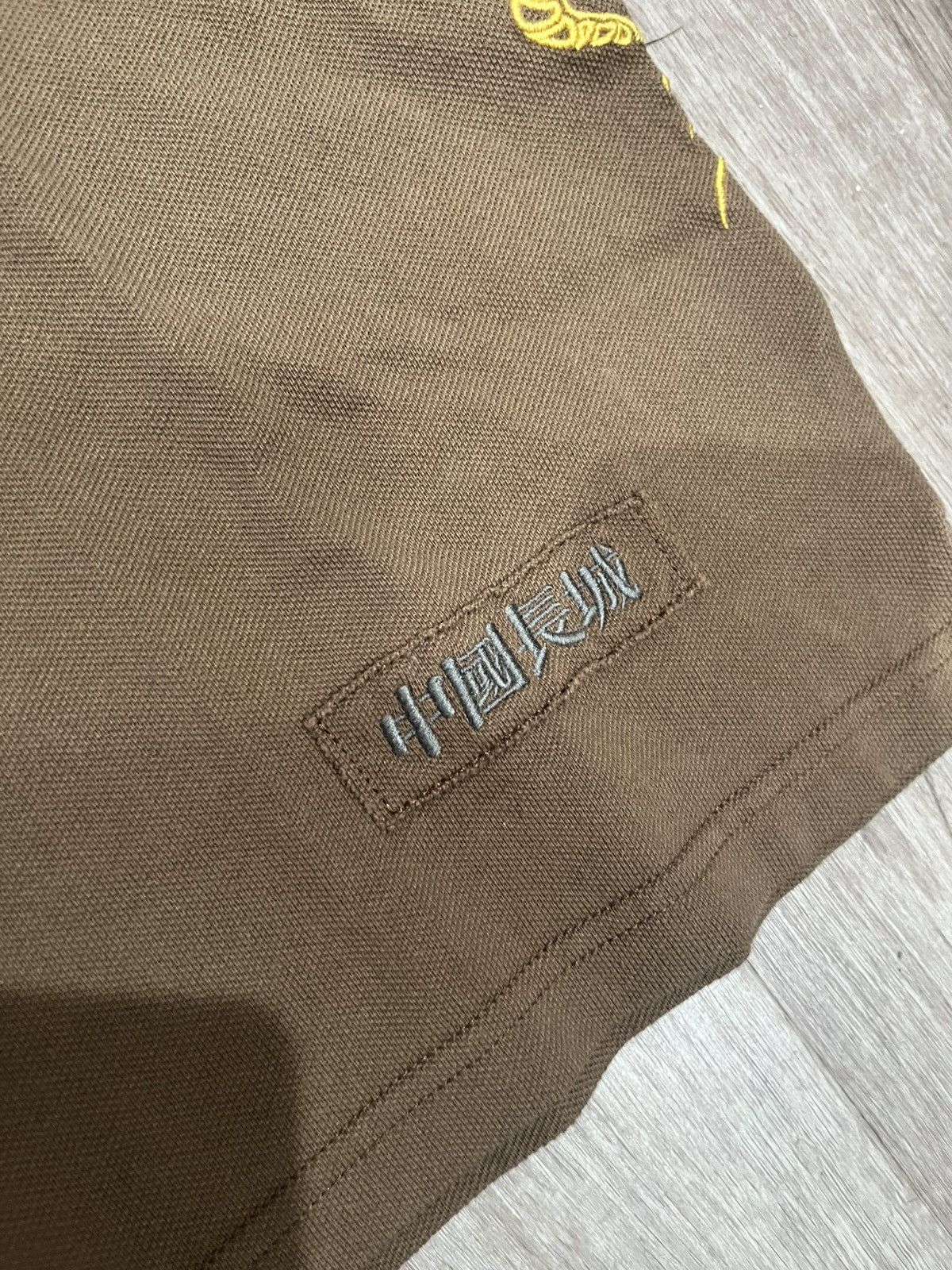 Supreme × The Great China Wall Supreme The Great China Wall Dragon Polo Brown Size US L / EU 52-54 / 3 - 4 Thumbnail