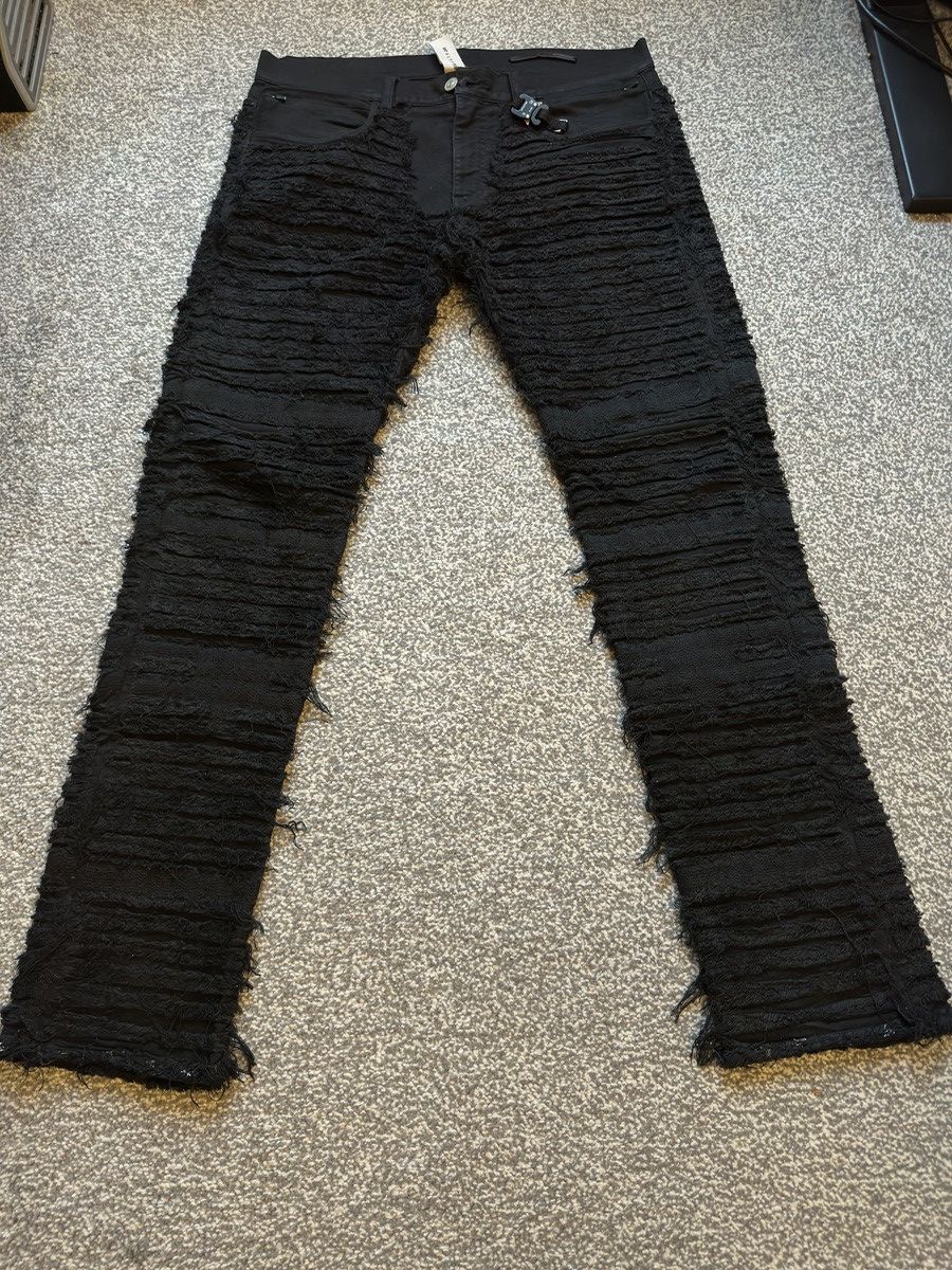 1017 ALYX 9SM x Blackmeans distressed denim jeans in black