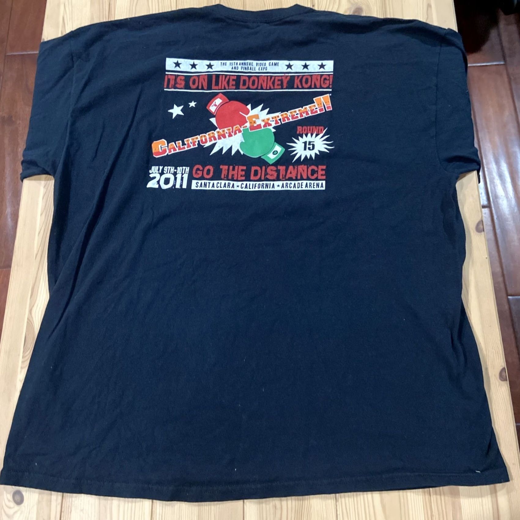 Gildan 2011 California Extreme Arcade and Pinball Show T-Shirt Men 2XL Black Gildan Short Sleeve Crew Neck Cotton Graphic Print Pinball and Video Theme Mens Size US XXL / EU 58 / 5 - 7 Thumbnail
