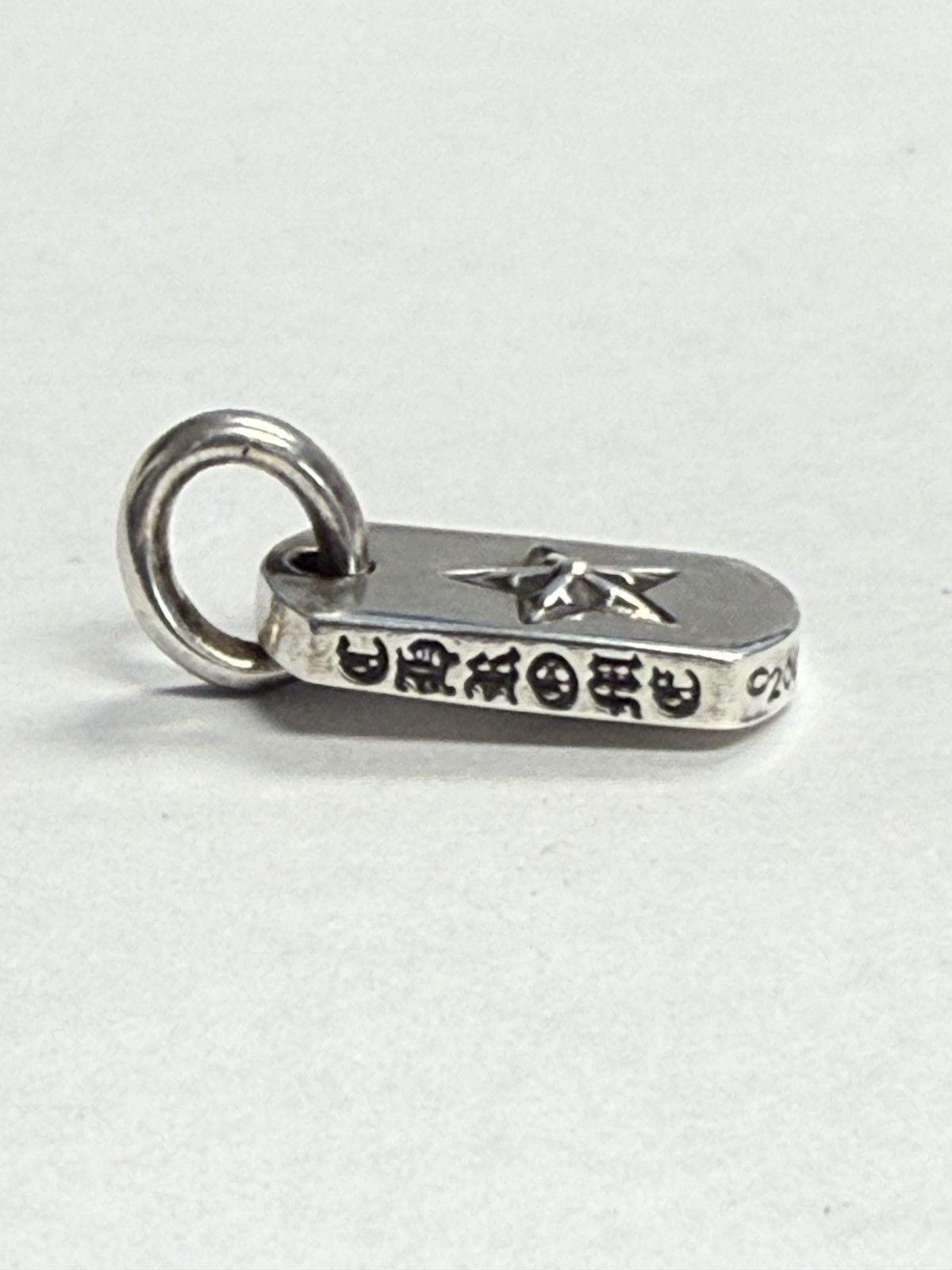 Chrome Hearts Chrome Hearts Tiny Dog Tag Star Charm | Grailed