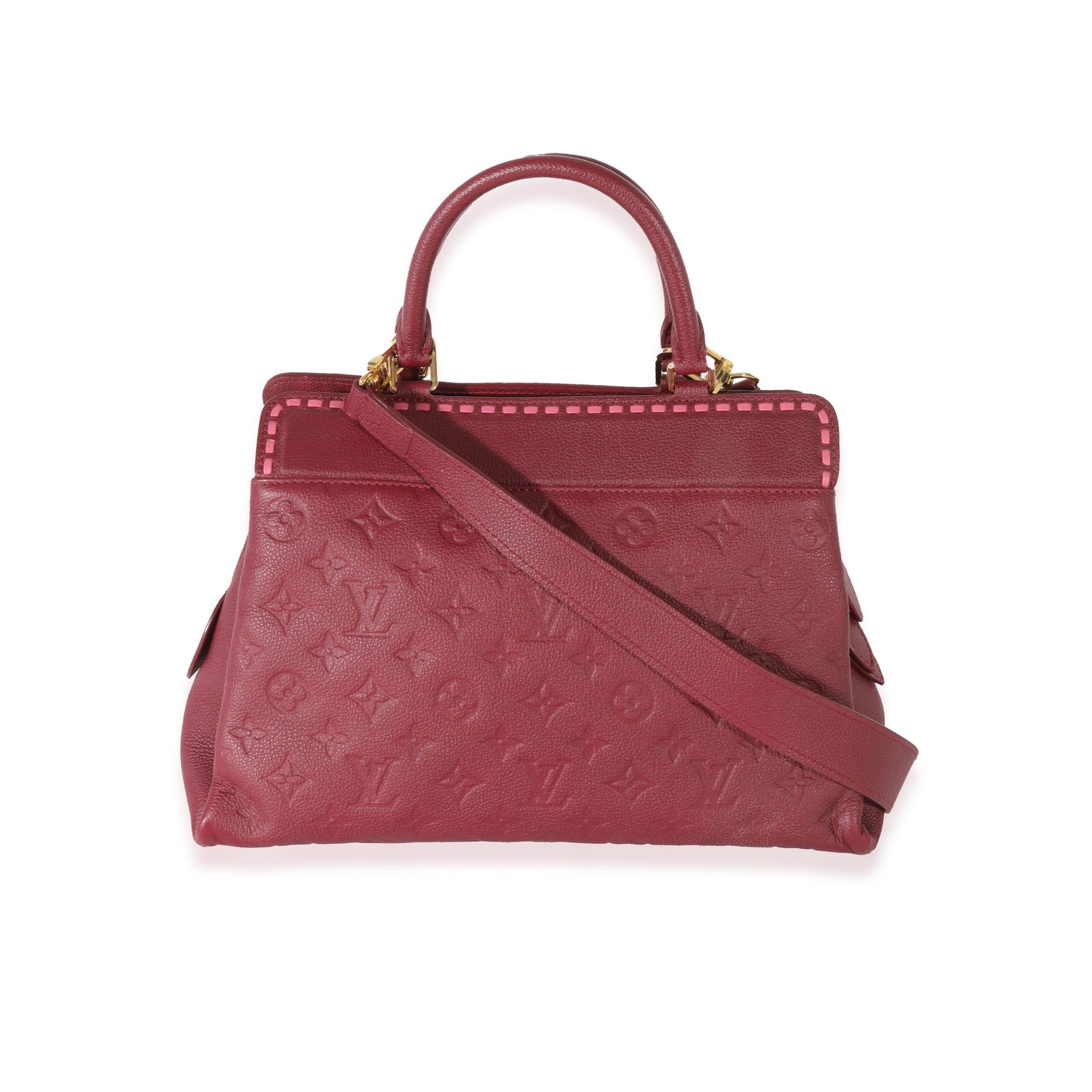 image of Louis Vuitton Raisin Empreinte Vosges Mm in Purple, Women's