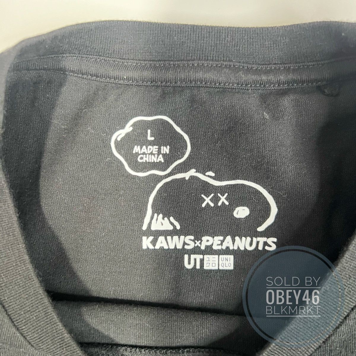 Kaws × Peanuts × Uniqlo KAWS x Uniqlo x Peanuts Snoopy Skateboarding Tee Black Size US L / EU 52-54 / 3 - 4 Thumbnail