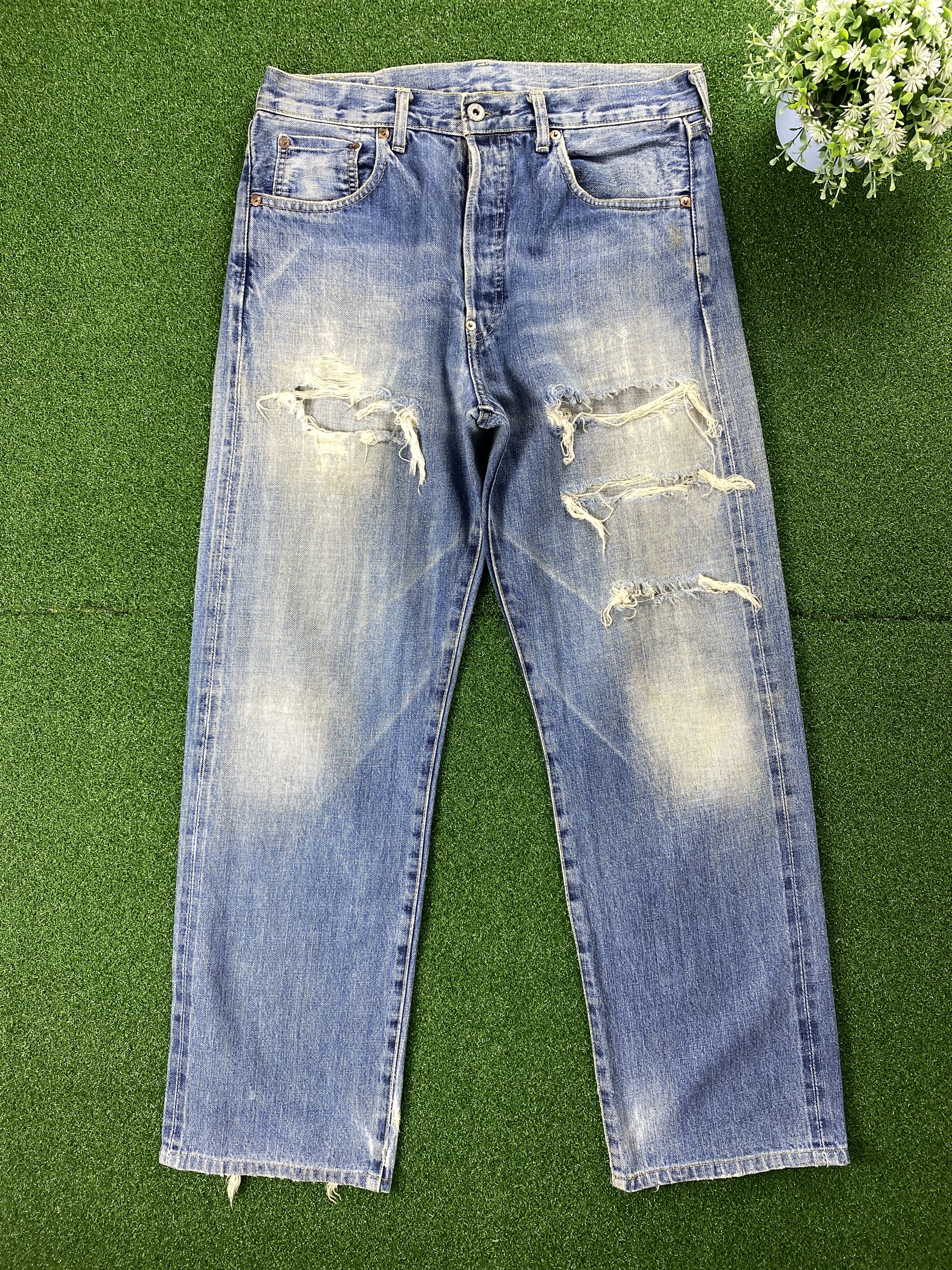 image of Levis x Vintage Selvedge Big E Vintage Levi's 702 Faded Distressed Jeans in Blue Denim (Size 33)