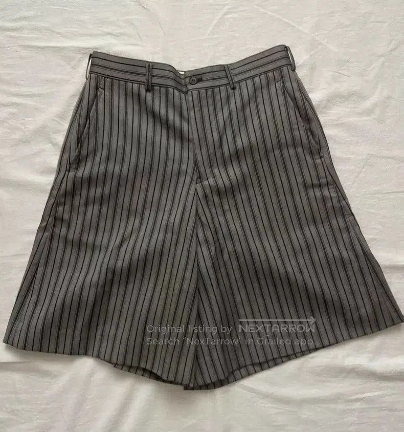 CdG Homme Plus Gray Striped Bermuda Shorts.