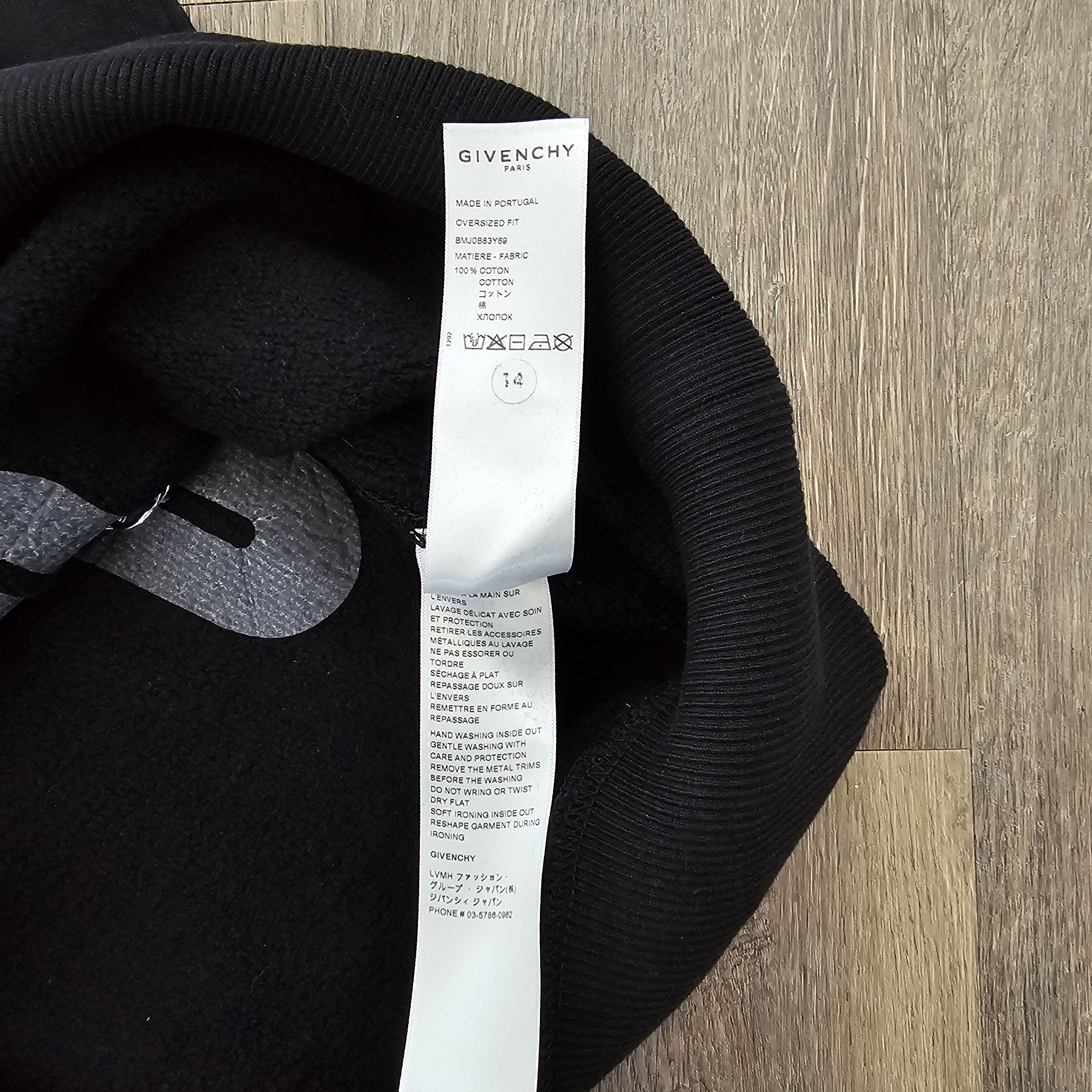 Givenchy logo-print eyelet-detailing oversized sweatshirt Size US S / EU 44-46 / 1 - 5 Thumbnail