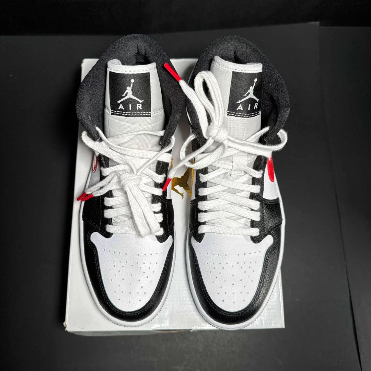 image of Womens Air Jordan 1 Mid 'alternate Swoosh' Sneakers in Black (Size 9)