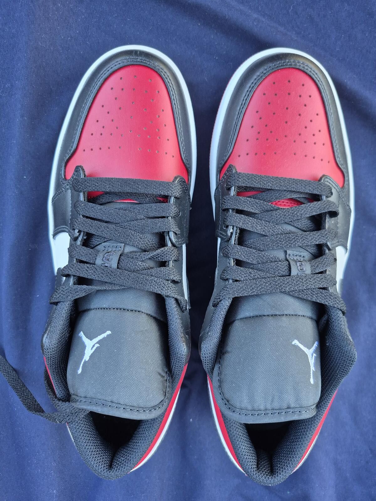 Jordan Brand Air Jordan 1 Low silhouette in a black, white, and red 9 M Size US 9 / EU 42 - 1 Thumbnail