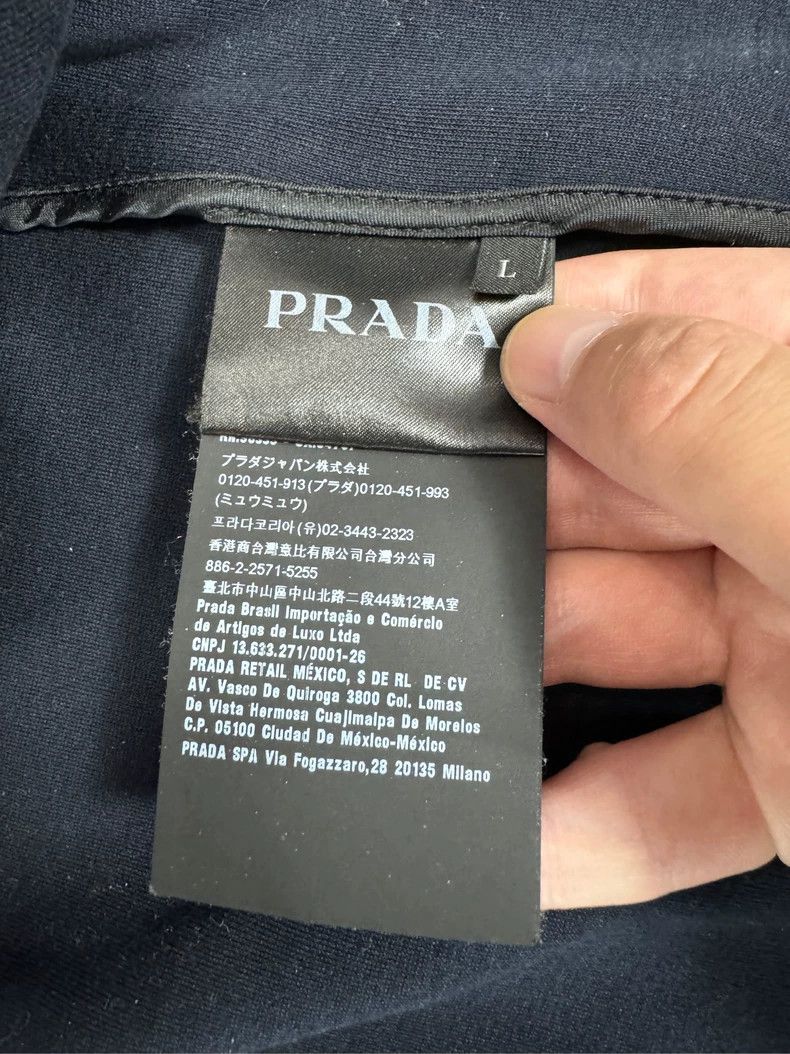 Prada Chest offset triangle logo color block stand-up colla