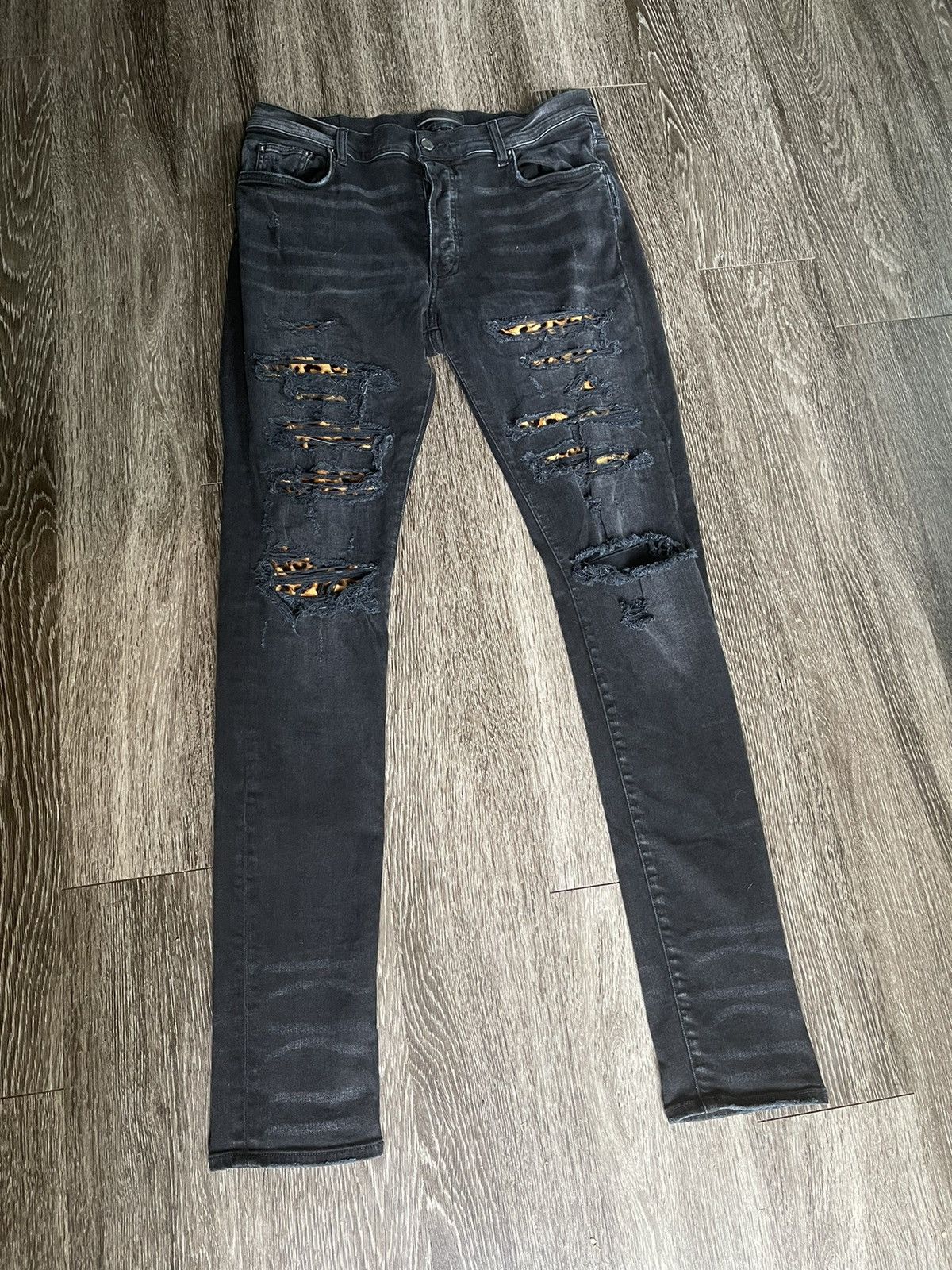 image of Amiri Mx1 Denim Black Distressed Leopard Jeans, Men's (Size 36)