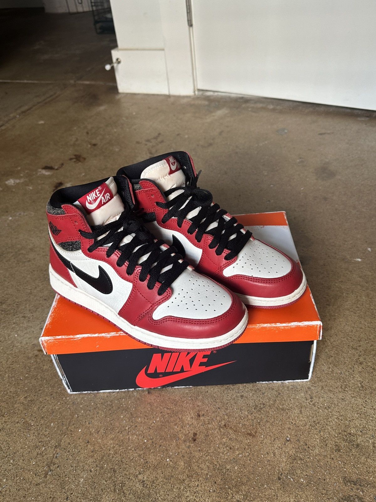 image of Jordan Nike Jordan 1 - Lost And Founds Shoes in Red, Men's (Size 7)
