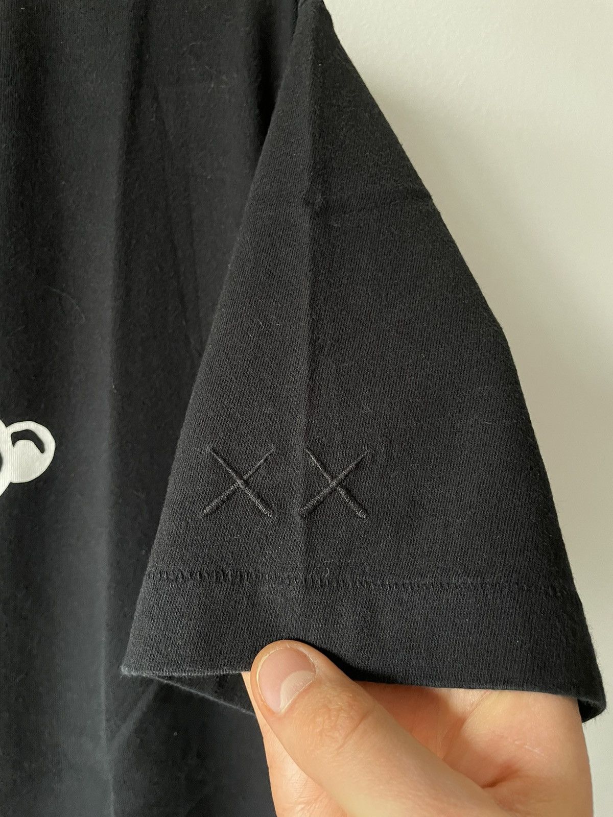 Kaws × Peanuts × Uniqlo Kaws Uniqlo Peanuts Snoopy tee Size US L / EU 52-54 / 3 - 4 Thumbnail