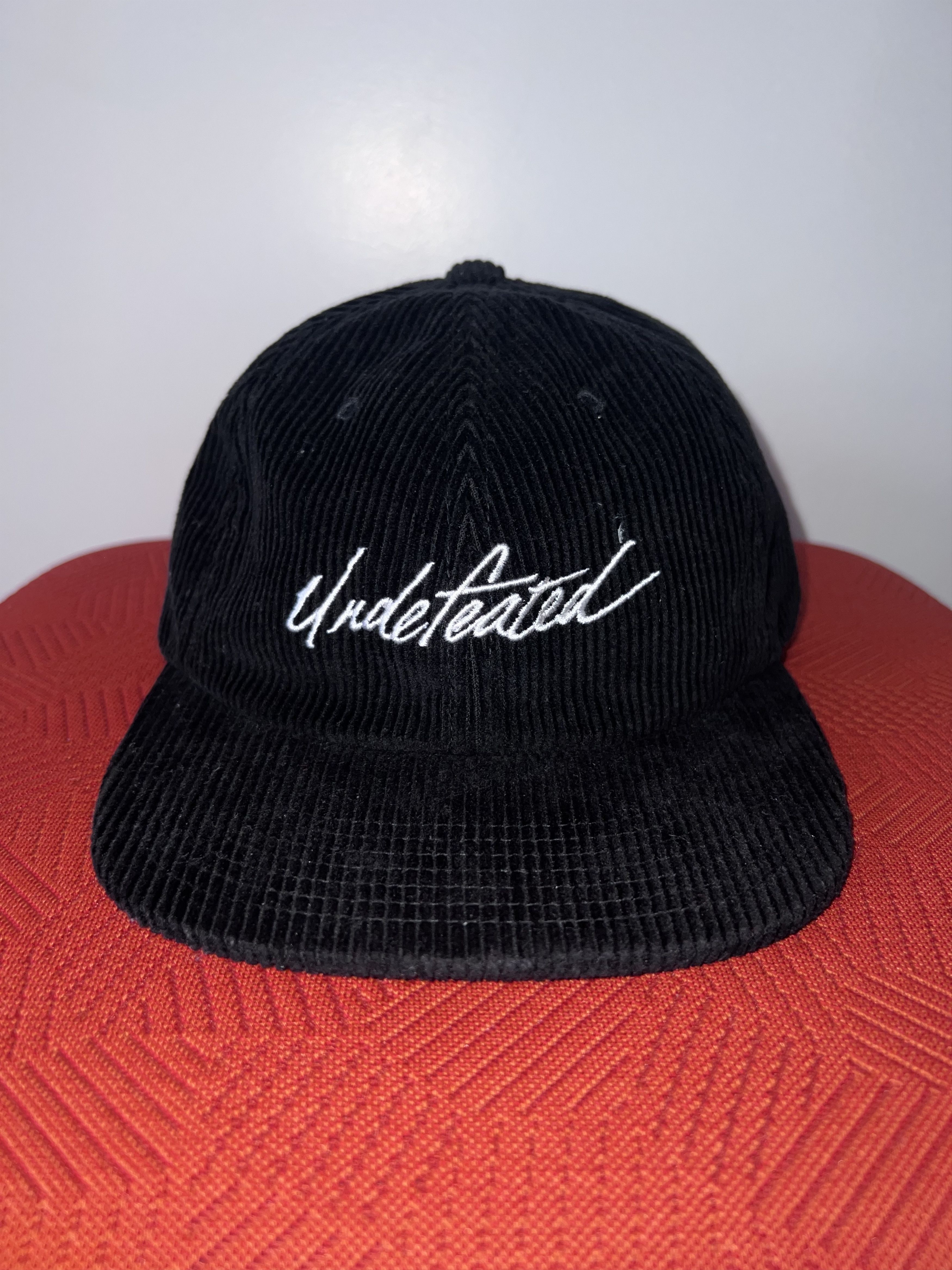 Undefeated Champion mrna Strapback