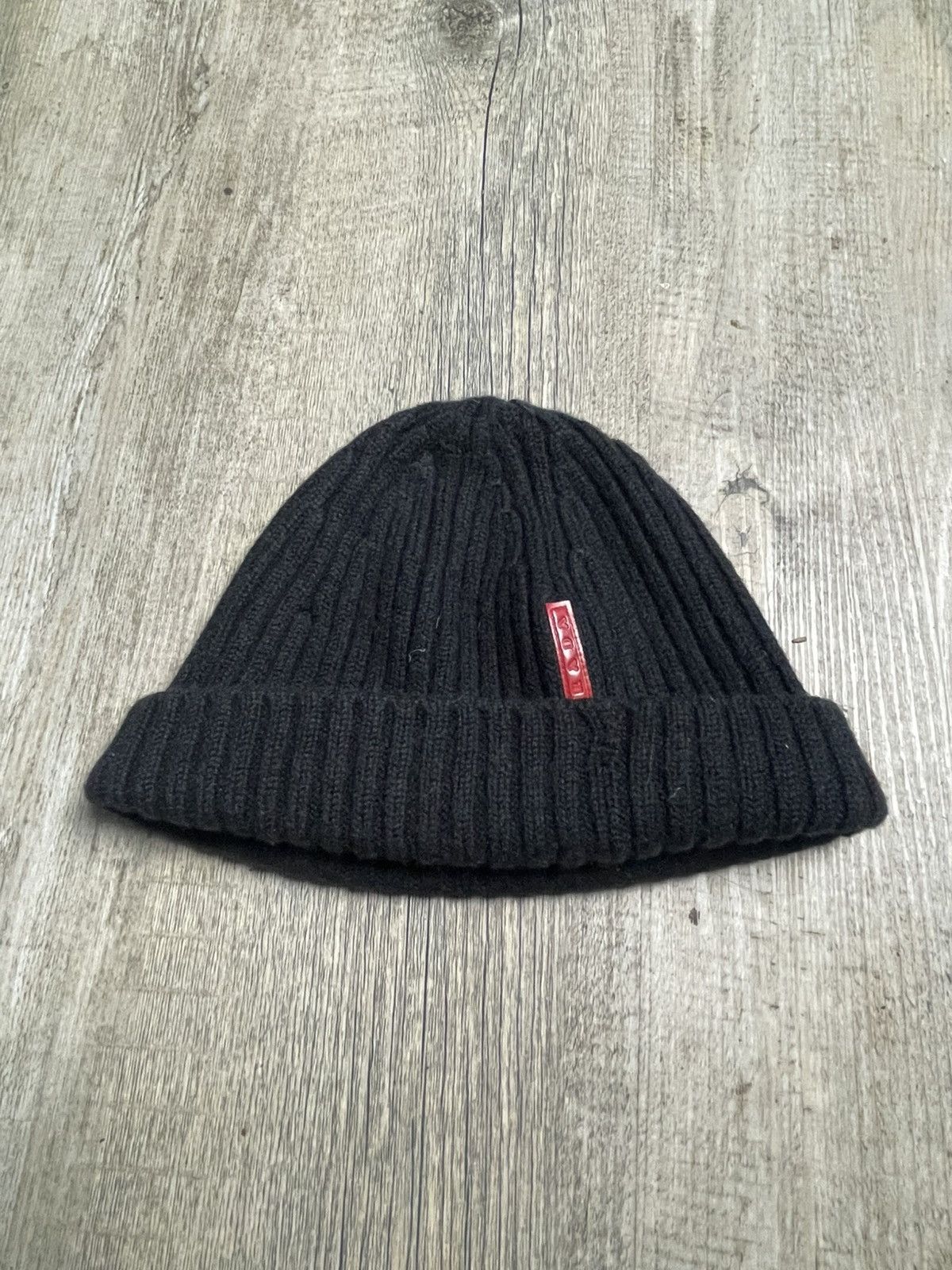 Prada Prada Ribbed Knit Beanie with Red Logo Tab | Grailed