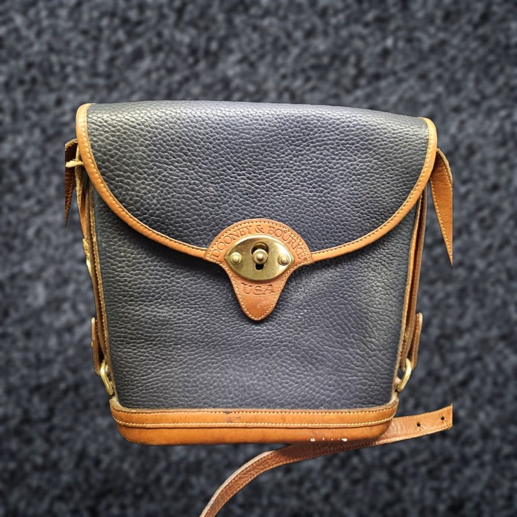 Dooney & Bourke VINTAGE Dooney & Bourke All Weather Leather Pebbled Finish Spectator Bag Navy Blue Bucket Bag Women Medium Brown Leather Strap 11" Gold Hardware Size ONE SIZE - 1 Thumbnail