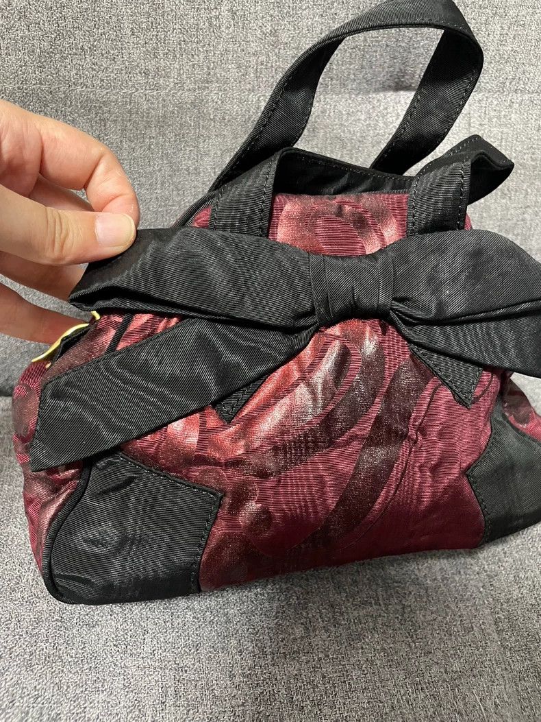 Vivienne Westwood Vivienne Westwood size os Mini graphic print bow handbag Size ONE SIZE - 7 Thumbnail