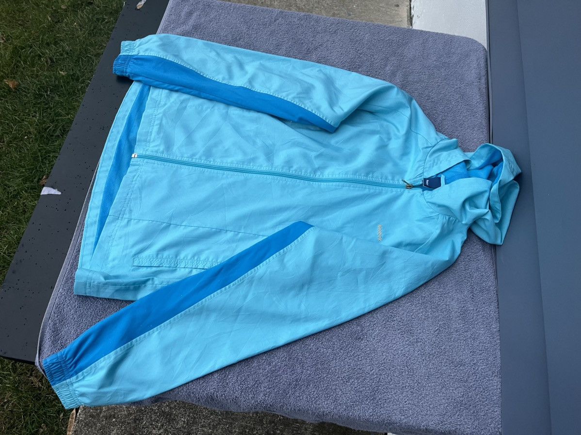 Reebok Brand new Reebok rain jacket Size L / US 10 / IT 46 - 1 Thumbnail