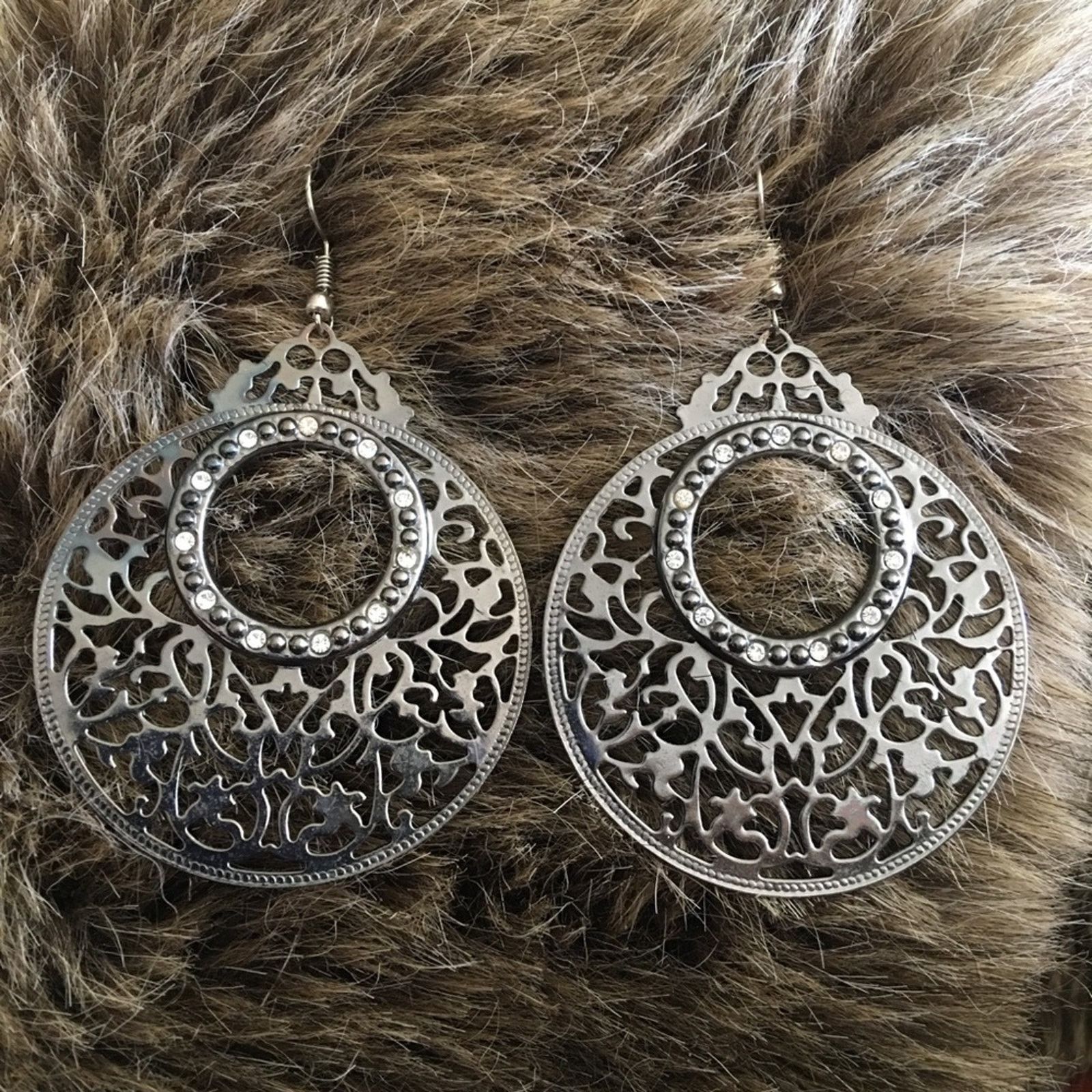 Jewelry Large chrome tone scroll rhinestone earrings Size ONE SIZE - 1 Thumbnail