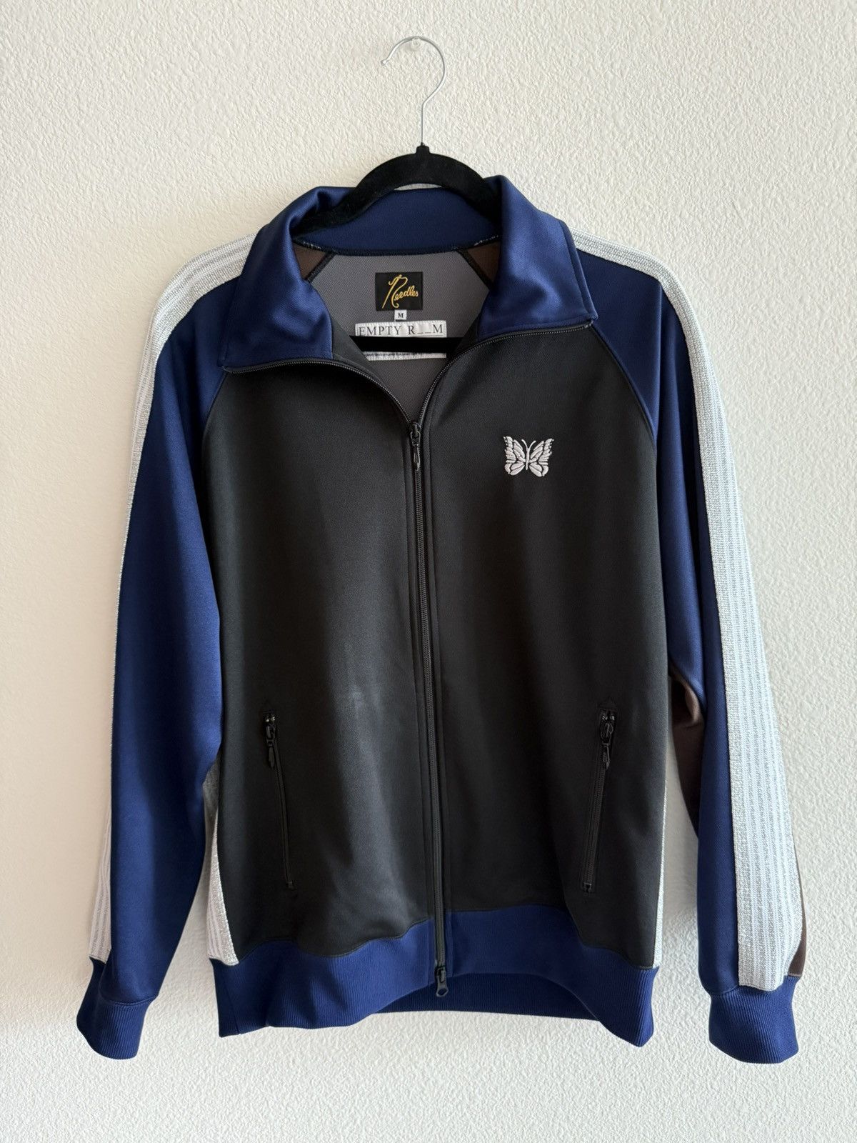 NUBIAN × Needles × Nepenthes Empty Room Nubian Track Jacket