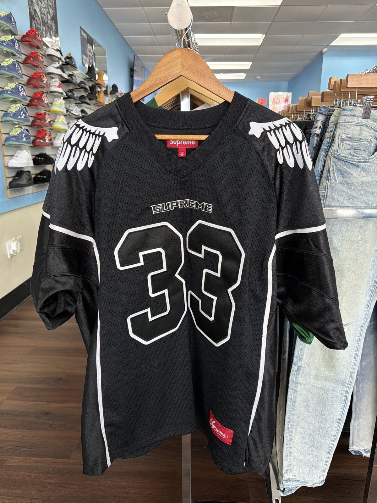 Supreme Supreme Wings Football Jersey Black | Grailed